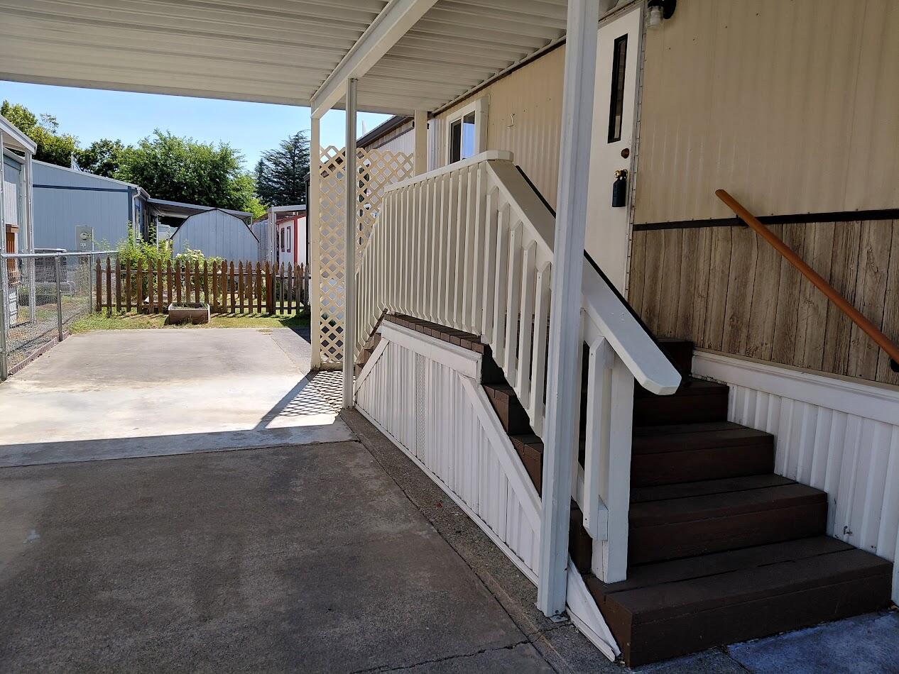 Charming, Cozy & Move-In Ready!
This cute-as-a-button 2-bedroom home has been lovingly maintained and is ready for its next chapter! Enjoy a bright, step-saver kitchen, updated lighting, and easy-care laminate flooring throughout. The seller has relocated, so this gem is priced to move!

Covered parking right at your front door adds convenience. 
And the park? It's a dream! Nestled along the river, it features a game room, a dog park, and a peaceful community deck perfect for relaxing or watching the water roll by. Affordable, adorable, and full of potential—come fall in love!