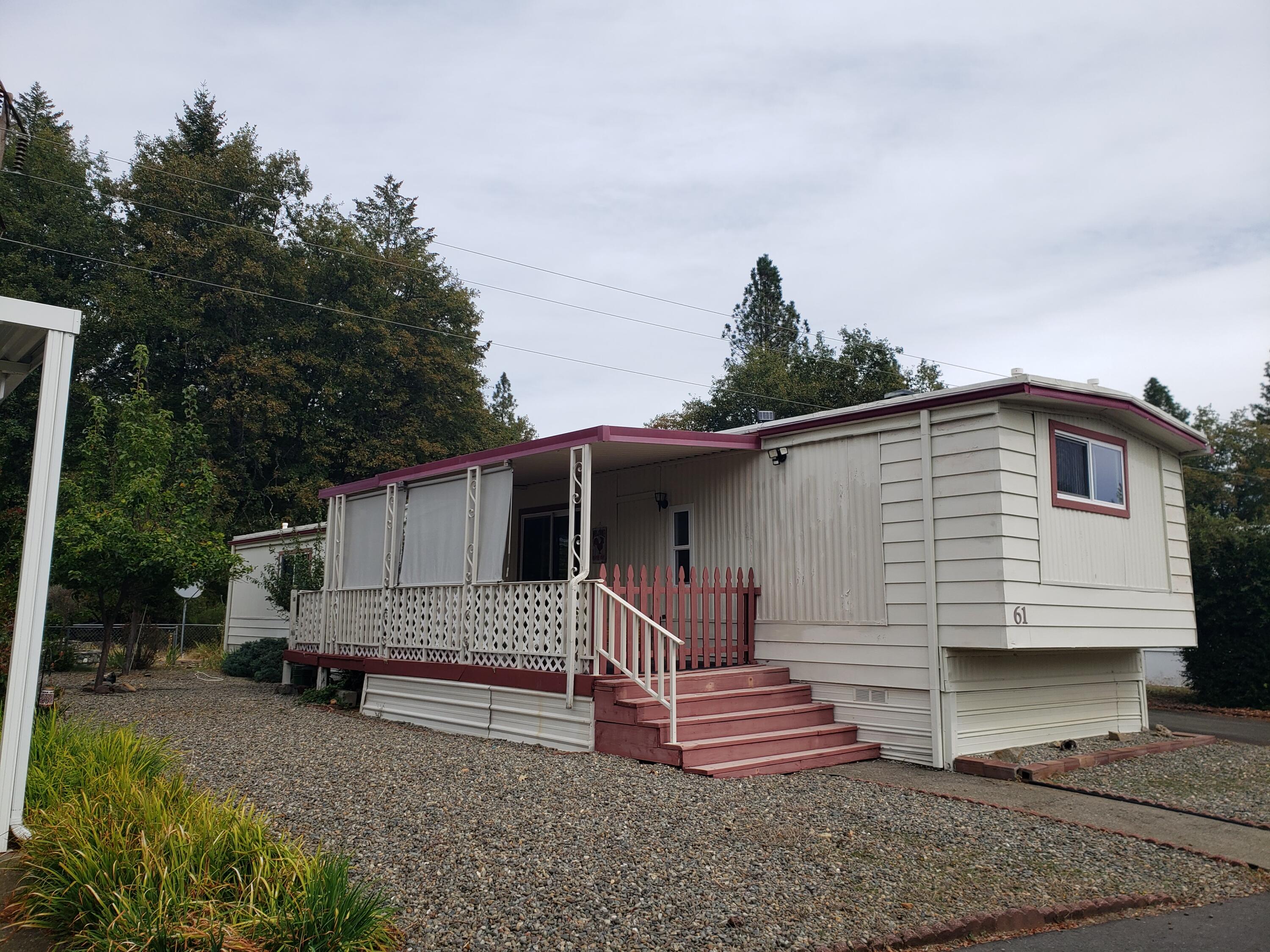 Really Cute Manufactured Home in desired River Valley Village, a Senior Mobile Home Park, a 55+ community Alot of custom touches here,that offers character to the coziness of this single wide charmer. Step up into dining area and kitchen which offers an open feel to the living space. New Range Oven and double paned windows have been installed as well as newer plumbing lines underneath. Furniture and Fireplace are negotiable if interested. Come join the community with  some of the lowest space rents in Josephine county.  Pets under 35 lbs considered. Application for tenancy needed after executed sales contract. $ 35. per adult. Check with On site Manager for Application. Come see for yourself, Today!!