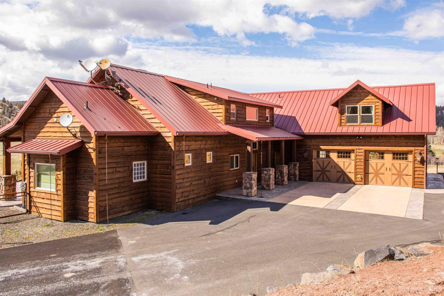 This Central Oregon ranch is a horse and cattleman's dream! McKay Creek Ranch is located in the most desired valley of Prineville, just 7.5 miles north of town and is a conveniently located near all the Central Oregon happenings. With everything you could need for an excellent horse and cattle set-up, including a beautiful Northwest Craftsman style custom home, 131.5 acres of irrigation and an amazing location. Plus, this ranch has some of the finest improvements you can find. These include an all concrete and pre-cast 96x40 barn with 6 stalls with runs, a tack room, bathroom, washer & dryer and double wash rack, a 200x350 outdoor riding arena with return alley and pens, a 108x36 machine shed, a 5 bay all concrete and pre-cast 96x40 shop, 144x36 hay shed, 36x36 hay shed, 3 additional dwellings and more. With 871.18 acres, this is a hunter's paradise and includes 2 LOP tags.