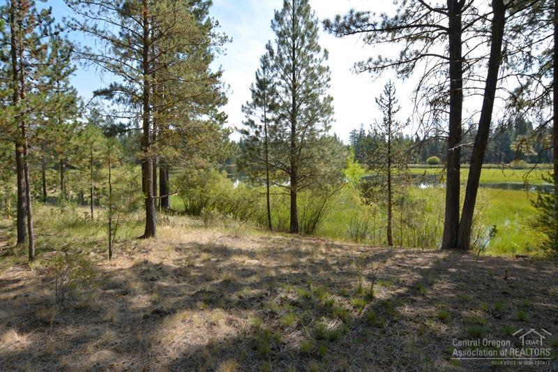 Enjoy riverfront living on this .67 acre. Come build your dream home or purchase the home adjacent to this lot for added acreage and privacy. Close to Sunriver, Mt.Bachelor and the Cascade Lakes.