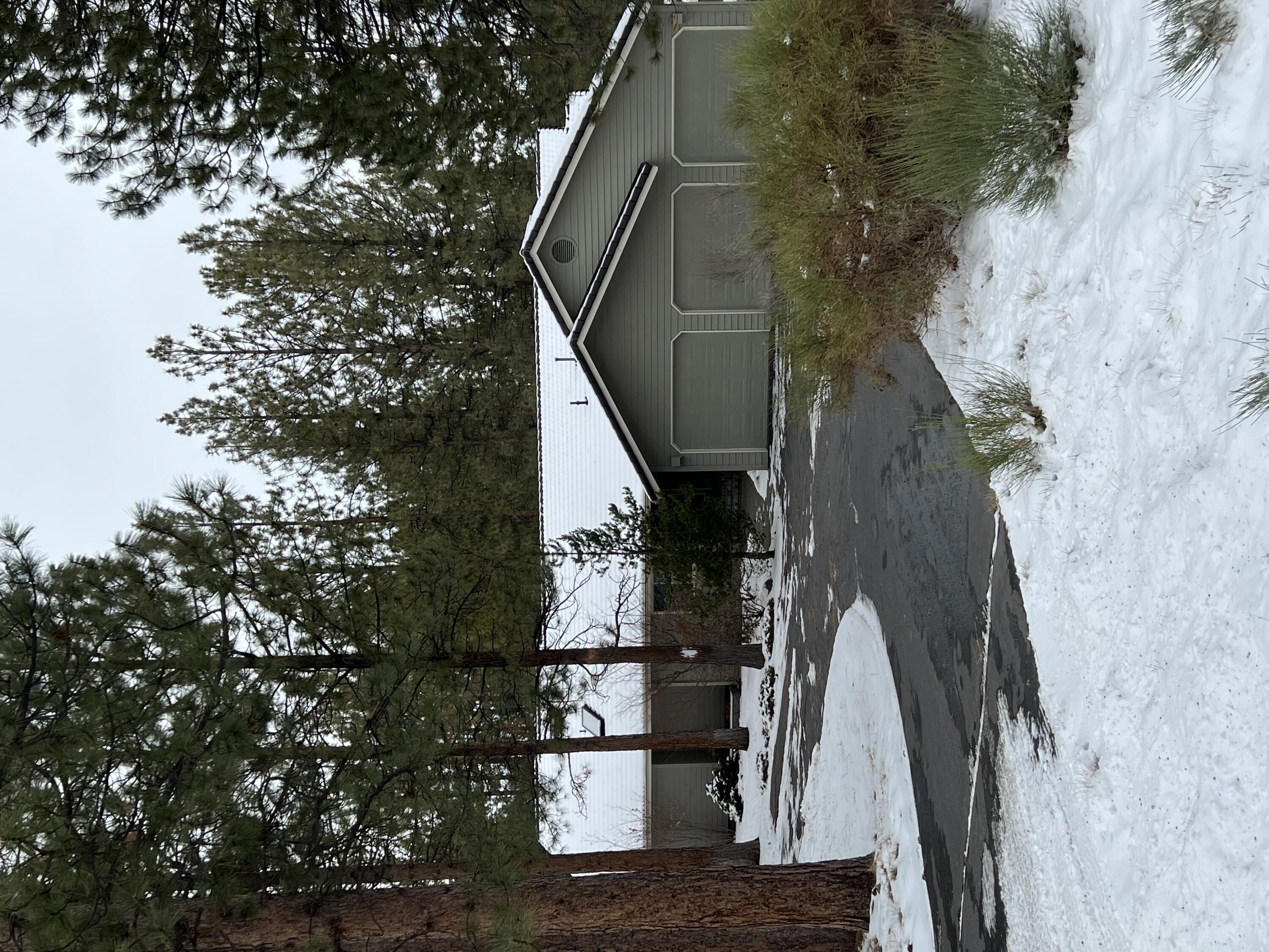 Awbrey Beauty single level home on a 1.11 acre flat lot offering the space you have been looking for to embrace the westside living on Awbrey Butte. This well built home has a tile roof, large primary bedroom/bathroom, additional two large bedrooms, spacious vaulted ceiling living room with wood stove heat, separate family living off of the kitchen, wide hallways and an oversized three door garage! Large rear deck with composite surface facing approximately three acres of neighboring rear yard open area for a feeling of much larger acreage living! Sylvan park, tennis courts and playground just across the street and Three Sisters Drive is a neighborhood home destination street between Promontory and Farewell Drives and not known as a common collector street.  This is just a great  quiet location on the north side of Awbrey Butte and very hard to imagine you are really living in the City of Bend! Very quick access north, south, east and west from this  homesite!