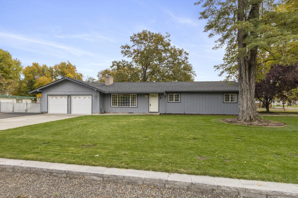 Great location! Turn-key single-level home on a spacious .53-acre lot in a desirable Central Point neighborhood. This 3-bed, 2-bath, 1,370 sq ft home features brand-new stainless steel appliances (less than a year old), newer carpet, and security cameras. Enjoy beautifully maintained front and back lawns with in-ground sprinklers on a timer, a fully fenced yard with jacuzzi. Property offers a powered work shed, RV parking with dump and power hookups, plus a garage with compressor and hook-up. Peaceful established area just minutes to downtown Central Point, schools, and shopping. Truly move-in ready and well cared for. Select photos are virtually staged to show potential layout and furniture placement.