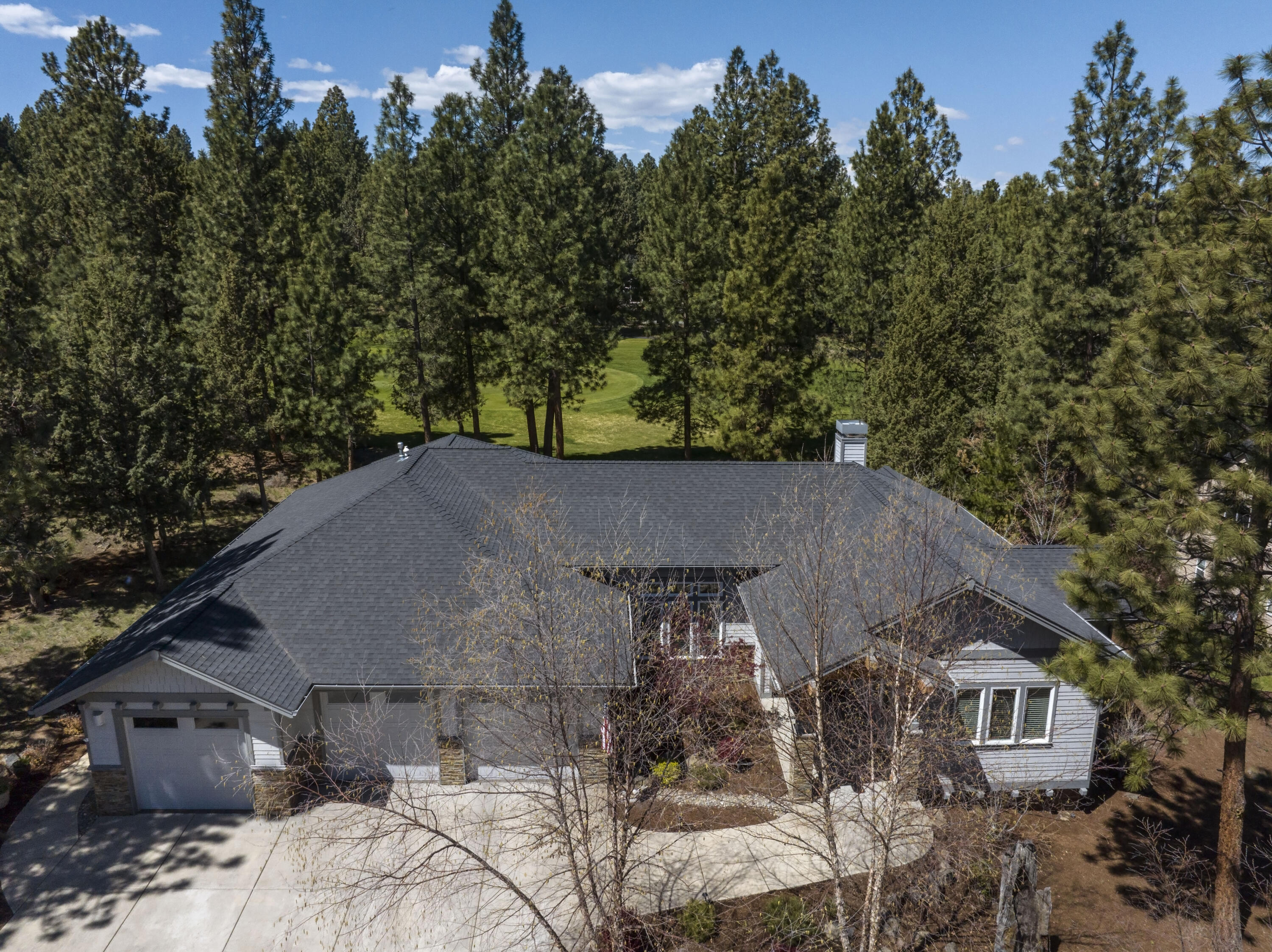 Lovely single level,  NO STEPS, golf course home on 17 fairway in Awbrey Glen.  This home features all the amenities that check every list....spacious bright kitchen, lots of natural light, large outdoor deck for entertaining, bonus room that can be office, 4th bedroom or crafts room, an amazing, oversized 3-4 car garage, that could be 4 car if needed, heated with large 'everymans' shop.  All this on one even level of living with plenty of elbow room on .42 ac lot.  Attention to detail with all those 'little' conveniences we look for.  Don't. miss this exceptionally well built home.