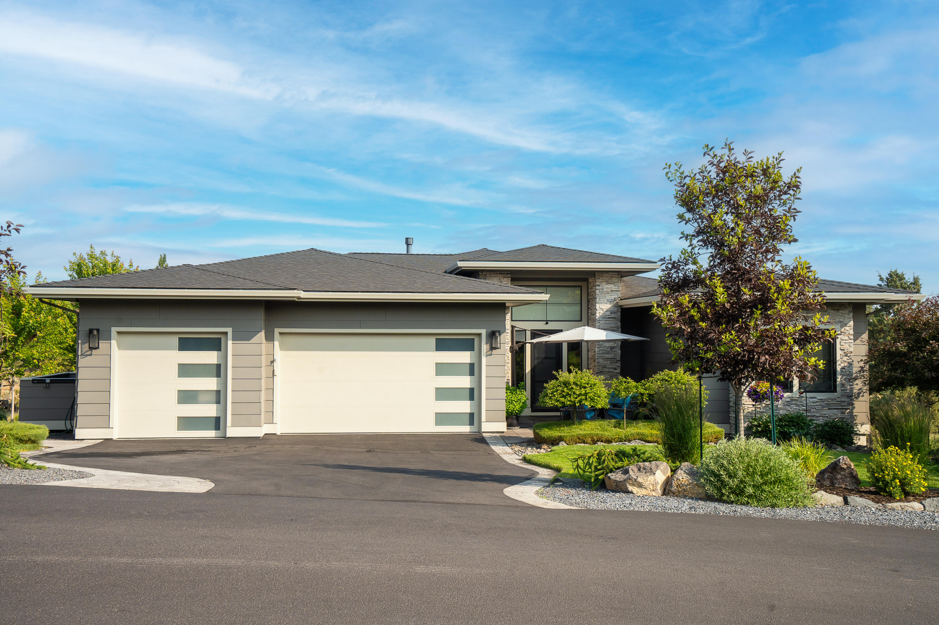 Located in the heart of Eagle Crest, this stunning single-level home offers the perfect blend of comfort and luxury. Built in 2020 on a generous .33-acre lot, it's in pristine, like-new condition—ideal as a full-time residence or vacation escape. An open floor plan provides excellent separation of space and centers around a light-filled Great Room with picture windows that capture the beauty outside. The gourmet kitchen features a large island and premium appliances, perfect for entertaining. A spacious primary suite includes a custom walk-in closet, soaking tub, and oversized tile shower. Step outside to a peaceful paver patio with dual remote-controlled awnings and views of the desert landscape. A 3-car garage with built-in storage completes this exceptional home. Enjoy world-class amenities including golf, sports centers, pools, tennis, pickleball, spa, and miles of scenic trails. Experience the best of Central Oregon resort living!