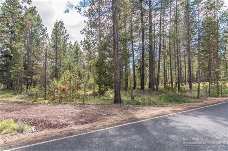 1/2 acre lot in the heart of a recreational haven. Just south of Bend, right outside Sunriver in an area with nice homes and just across the street from riverfront homes. This lot may allow of your dream home - if permits allow. The community park and boat ramp are blocks away. Neighborhood borders over 250,000 acres of US Forest Land open to hunting and recreational use. Numerous lakes abound filled with remarkable fish and vistas. OWC financing possible.