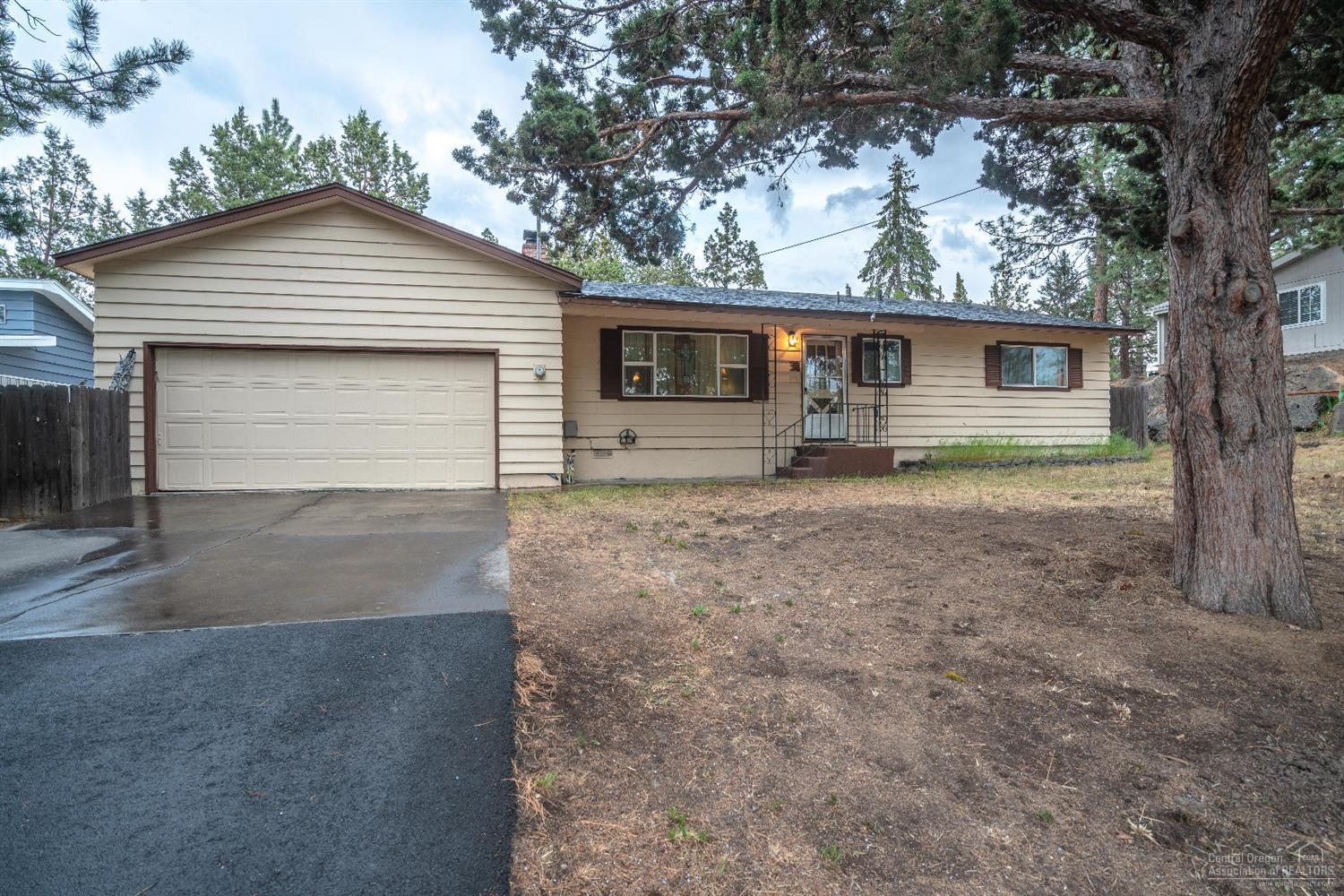 Perfect Starter home or Investment property in established neighborhood. A short drive to Pilot butte, Costco, Ponderosa park and Schools. New Vinyl Windows, new roof 2017, hardwood floors, open fireplace and granite counter-tops.
