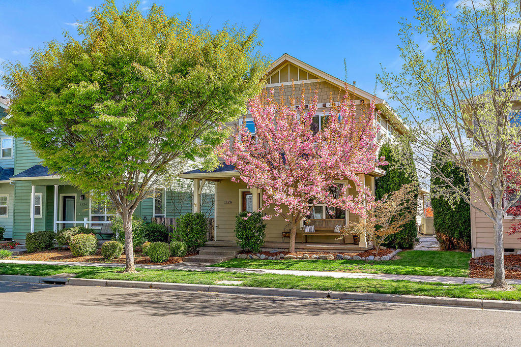 Just listed! A beautiful home crafted by Vision Homes in the award winning Twin Creeks Development, backed by a pocket park and 1 block to a 7 acre Civic site. Great curb appeal with an inviting front porch. Spacious great room with ceiling fan open to dining area with beadboard wainscotting and newer gorgeous Acacia hardwood flooring. Kitchen with eating bar, granite counters, stainless appliances, and hardwood floor, adjacent large pantry. Large utility room. Main floor powder room and additional storage. Dining room slider leads you to a private side yard with raised beds and a HUGE paver patio. Upper story is a large master suite with walk-in closet, spacious shower, beautiful vanity. Linen Cabinet. Guest full bath with tub/shower. Guest Bedrooms are spacious, one has a new custom closet with built in drawers. Alley access to 2-car attached and finished garage. Directly behind home is a neighborhood pocket park with covered structure. You'll love the style and quality!