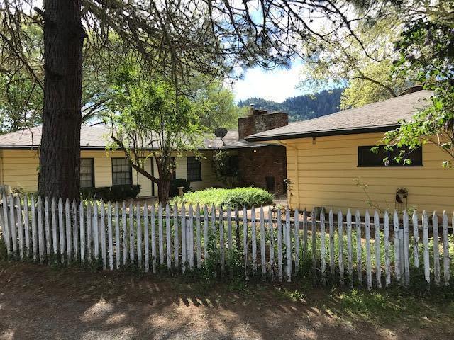 Opportunity knocks.. to find 9.21 level acres and a 2396 square foot home with garage shop in this price range is rare. And, yes, there are repairs and updating that needs to be done to bring it back to the gem it once was. Originally built in 1948, the home has charm and character, a front courtyard, towering beautiful trees and views overlooking the pasture and property.. Being sold ''as is''.