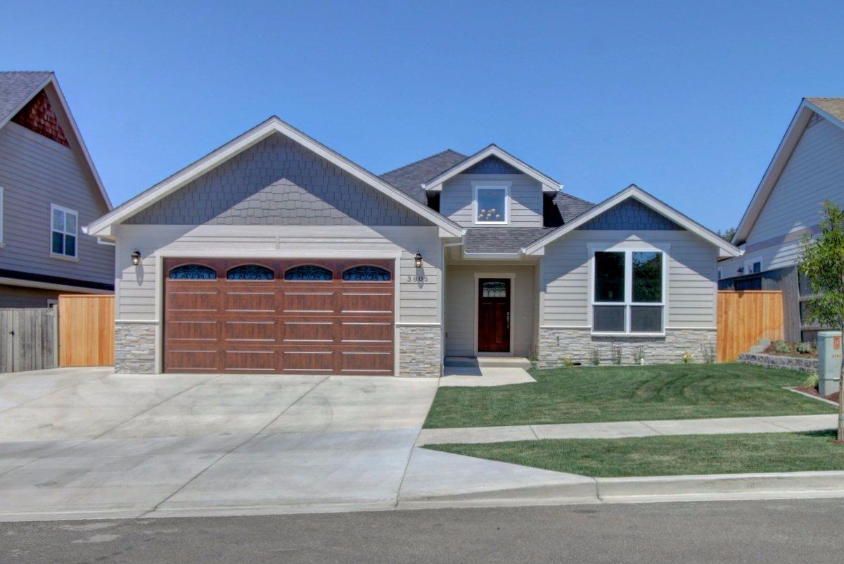 Just completed! This well appointed 2,020sqft 3 bed 2 bath Stonegate Home features an open floor plan. Tons of upgraded finishes throughout! Kitchen boasts granite counter tops, under mount sink, black stainless appliances including wine fridge, under cabinet lighting and nice sized pantry. Living room with stone gas fireplace. Vaulted master suite with a Huge master bath and all the necessary amenities; tons of cabinetry, double sinks, soaker tub, double headed custom tile shower and walk-in closet with built ins. Wonderful laundry room and ample storage throughout. Take in the views of Roxy Ann on your Oversized covered conctete patio and private backyard, fully fenced and landscaped. Plenty of parking, deep garage bay and paved gated side parking.