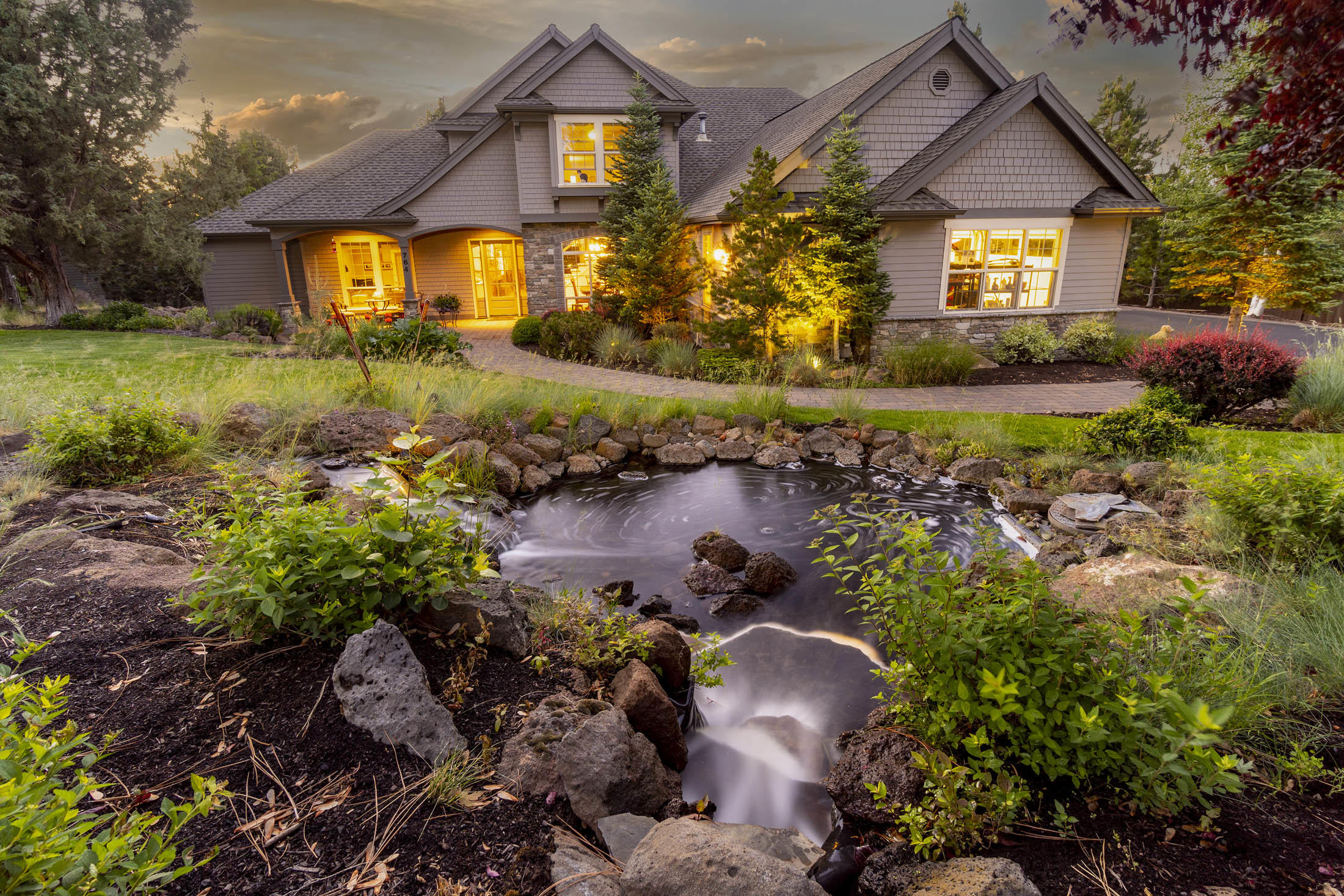 Beautiful Custom Built home situated on a breathtaking fully landscaped lot.  Great Room with Volume Ceilings, ''Heat N Glo'' Fireplace, Built-in Cherry Cabinets & Surround Sound System.  Gourmet Kitchen has ''Viking'' 6 Burner Stove, ''Kitchen Aid'' Built-in Refrigerator, Huge Kitchen Island with Prep Sink, Walk-in Pantry, Glorious Cherry Cabinets & Under Counter Lighting.  Formal Dining Room with wonderful detailed Ceiling & Butlers Pantry. Main Level Master Suite has Organized Walk-in Closet with Built-in Drawers, See-thru Fireplace to Bath, Dual Vanities & ''Jacuzzi'' Soaking Tub with Separate Shower.  Main Level Office with Beautiful Built-in Cherry Cabinets.  Guest Bedrooms are upstairs with Flex Room that easily can be 4th Bedroom.   Enjoy Outdoor Entertaining on your Pavered Patio & Enjoy the Lush Landscaping.  Minutes to Sawyer Park with a great trail system to downtown.  And much, much more!