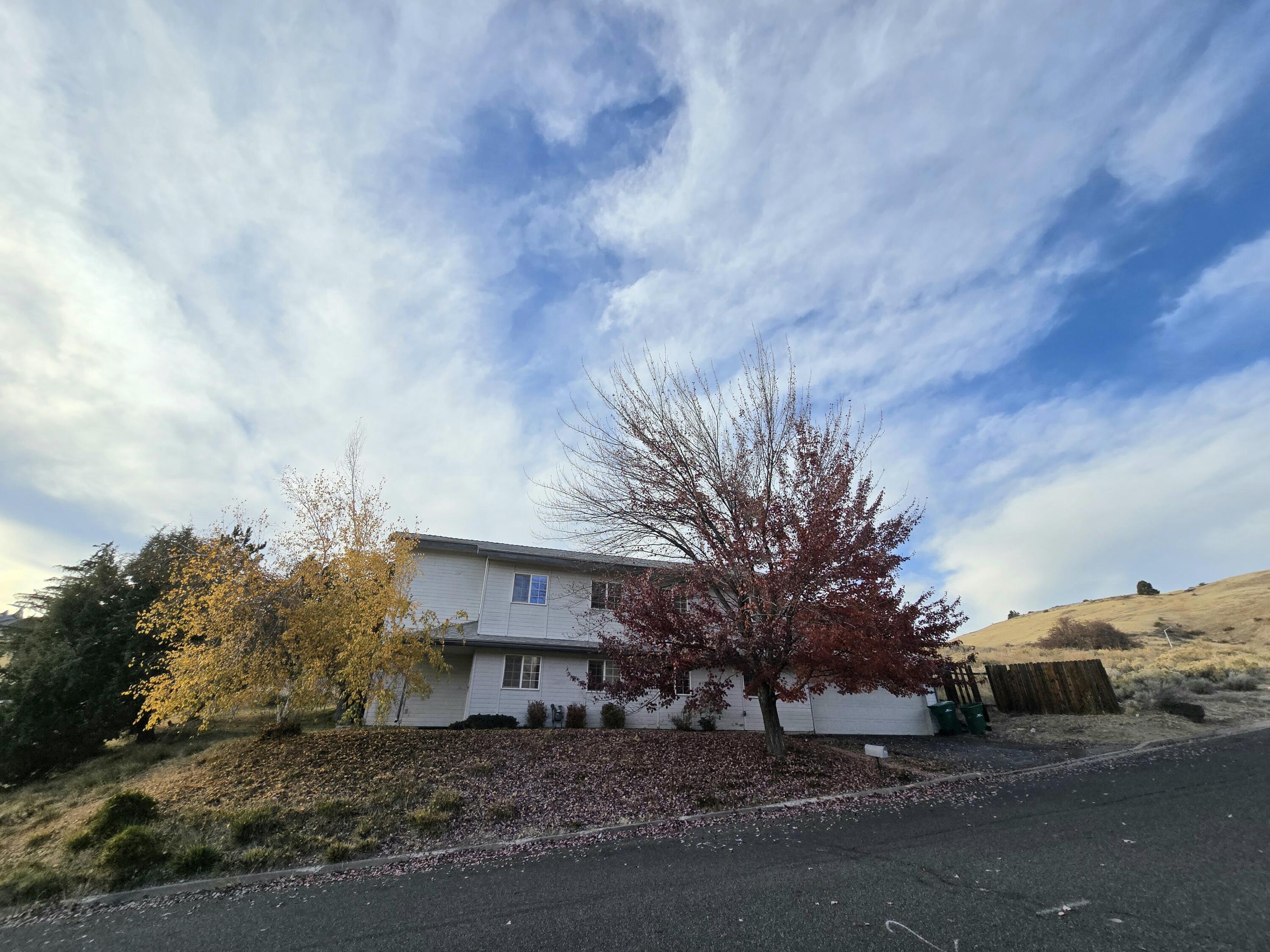 Welcome home to 402 Mountain View, tucked in the highly desirable Nob Hill subdivision—where tree-lined streets and spacious homes reflect the heart of Klamath Falls' growing community. This beautifully refreshed 4-bedroom, 3-bath tri-level home offers new flooring, fresh interior paint, and a warm, move-in-ready feel. The open layout flows easily between multiple gathering spaces centered around the kitchen, perfect for everyday living or entertaining. A sunny loft with a closet provides the ideal home office or creative retreat. Set on a .44-acre corner lot, this home captures views of the surrounding mountains and neighborhood charm. With a newer roof, attached 2-car garage, and proximity to OIT, Sky Lakes Medical Center, and downtown, this home blends comfort, convenience, and the welcoming spirit of Klamath Falls' continued growth.