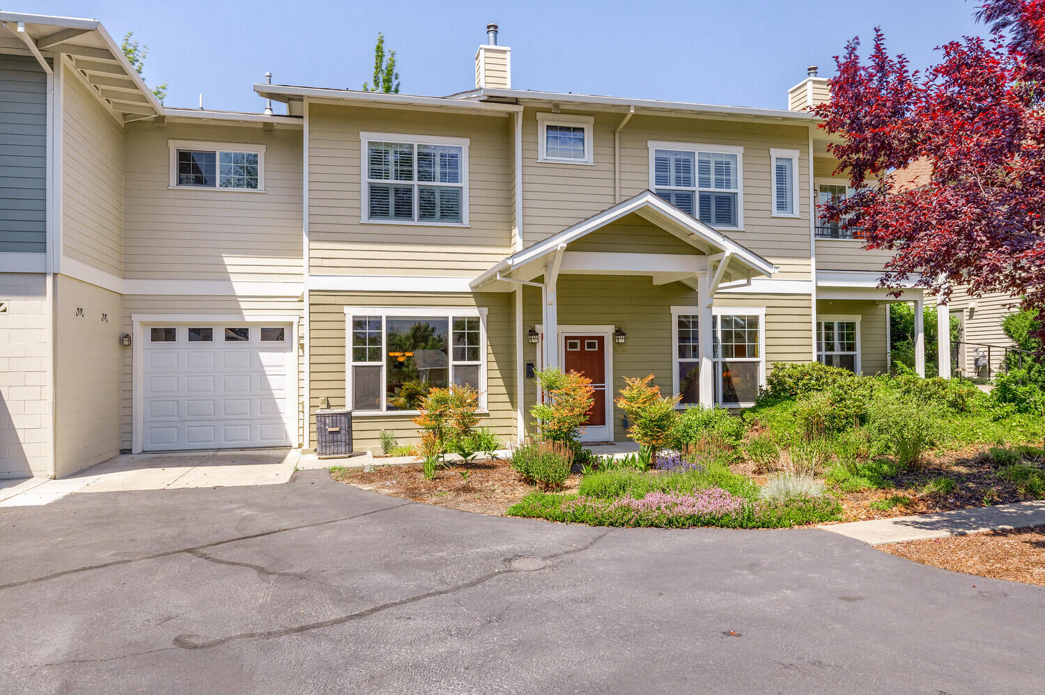 Explore serenity in this well-maintained single-level condo on a quiet cul-de-sac in Ashland's Mountain Meadows. This ground-level gem offers two bedrooms, two bathrooms, and an attached garage. The light-filled living room features a beautiful gas fireplace, creating a cozy focal point. The kitchen, with solid wood cabinets, flows seamlessly for cooking and entertaining. Relish the spacious primary bedroom with an ensuite bathroom, walk-in closet, and extra sitting/reading area. The second bedroom, perfect for guests or a home office, connects to another full bathroom. Convenience meets style with a large laundry room providing extra storage. Experience low-maintenance living and energy efficiency. Enjoy the beauty and camaraderie of Mountain Meadows and Ashland. Monthly dues include $270.51 for the condo association, $878.85 /month for one person, or $1173.85 /month for two people. Embrace comfort and community in this inviting Mountain Meadows residence.