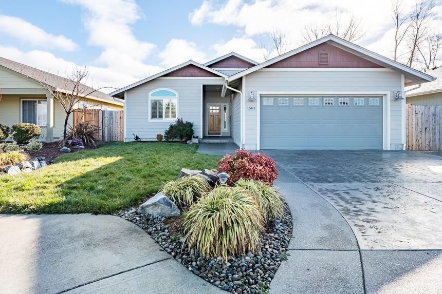 Beautiful Kirk Chapman Home greets you with attractive curb appeal. Inside features three bedrooms, two baths, 1504 sqft with an extra room currently being used as an office. Home is filled with warm natural light, engineered hardwood floors, vaulted ceilings, dark stainless-steel appliances and leather finish granite counter tops in the kitchen, along with many other beautiful finishes. The living room includes an open floor plan, which connects to the kitchen and dining room, which makes it perfect for entertaining! The master suite has vaulted ceilings and in-suite master bath with granite counter-tops and a walk-in closet. The back yard offers a well-maintained lawn and lighted covered porch with access from the master suit. A nice bonus is the added privacy behind the house with an open green space. Call now to schedule your showing!