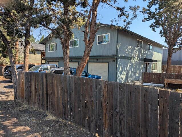CAP Rate over 6%!  Great opportunity to own an excellent investment property in wonderful Bend, Oregon! Three beautiful units - all tastefully remodeled in 2022. Brand new furnaces in all units.  Convenient SE Bend location. Close to shopping and other amenities. Beautiful laminate flooring, cabinets, and countertops. Each unit has a garage and a fenced backyard. Lucrative investment! Excellent CAP rate.