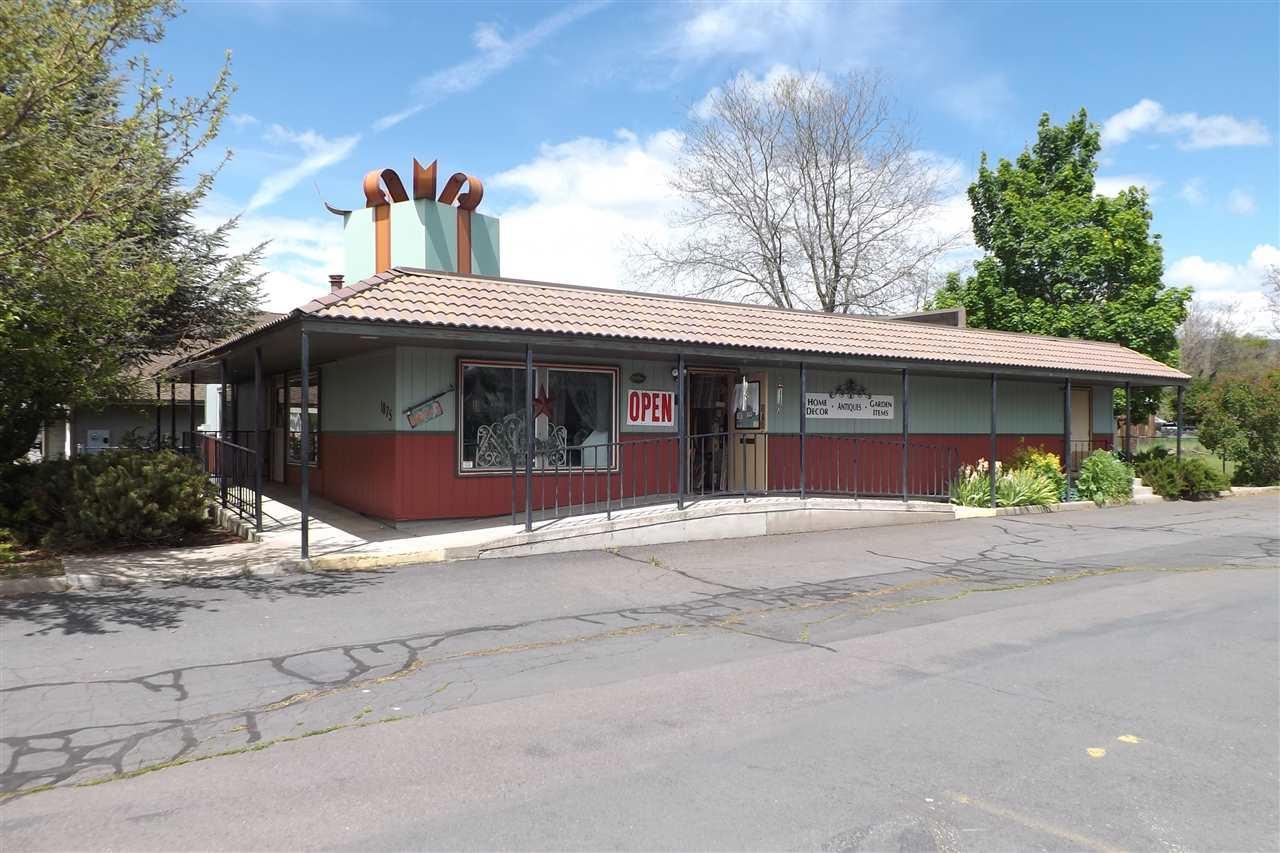 3000 Sq. Ft. Commercial Building In The Center Of Many High Traffic Professional Offices, Restaurants, Retail Stores And Directly Across From Thunderbird Market. This Would Be A Perfect Location For Medical/Dental Office, Retail Space Or Professional Services. Building Sits On A Large Lot With Mature Landscaping And Over 20 Parking Spaces.