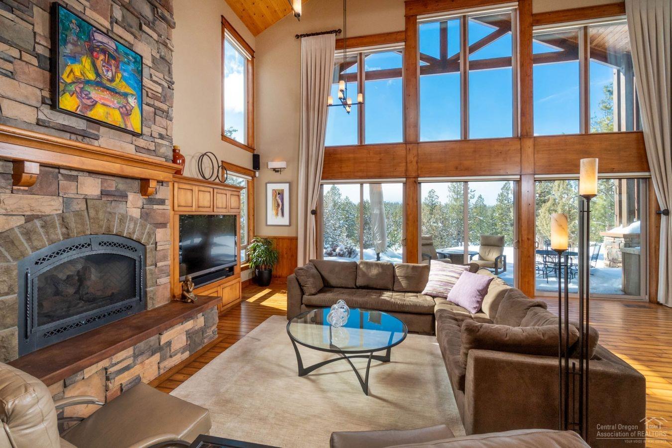 Awbrey Glen Beauty w/ Spectacular Views of the Cascades & Golf course situated on the 2nd Fairway. Great Rm has Soaring Ceilings w/ Wood Beams, Raised Hearth Stone Heat N Glo Gas fireplace, Hardwood Floors, Built-in Cabinets, Hubbardton Forge Light Fixtures, Walls of Glass allowing Wonderful Natural Light & Open to the Kitchen & Dining Area. You'll enjoy Cooking in your Gourmet Kitchen w/ 5 Burner Gas Wolf Cooktop, Double Wolf Ovens, Sub Zero Extra Wide Refrigerator, Center Island w/ Prep Sink, Spice Cabinets, Walk-in Pantry, Wine Fridge, Beakfast Bar & Stunning Granite Counters. Main-Level Romantic Master Suite has Cascade Views, Sitting Area, Fireplace, Large Walk-in Closet w/ Built-ins, Dual Vanities, Jetted Tub, Walk-in Shower with 2 heads & Heated Floors. 2 Additional Guest Suites w/ Shared Bathroom are on the Main Floor. Upstairs has Lit Staircase, Large Loft Area, Guest Suite w/ Full Bath & a Huge Bonus Rm complete with Wet Bar, Fridge & Balcony. And Much More!