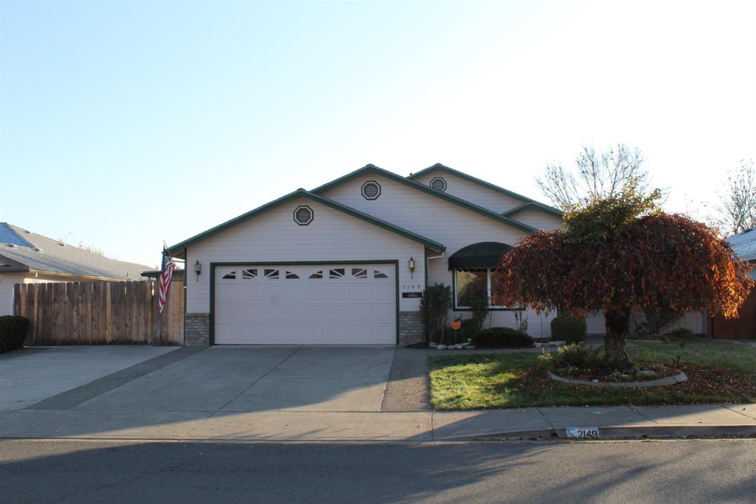 This beautiful move in ready home has it all and is at the lowest price point in the area. Located just south of South, this home features an open floor plan, a light and bright kitchen with plenty of cupboards and counter space, an eating bar and a tiled back splash. There's a formal dining area and a kitchen dining area with bay window. All the bedrooms are large with the master suite having a large walk in closet, jetted tub, walk in shower, double sinks and a private privy. Large utility with cupboards, counter and sink. The garage is finished with a work bench and lots of built in storage units. The sunroom offers warmth with a gas fireplace and 2 sliders to the big back yard featuring a gazebo, dog run and an attached shop. There is also a remote controlled retractable awning on the back patio. There's plenty of RV, boat, toy parking on the side. This is the perfect property for any family.