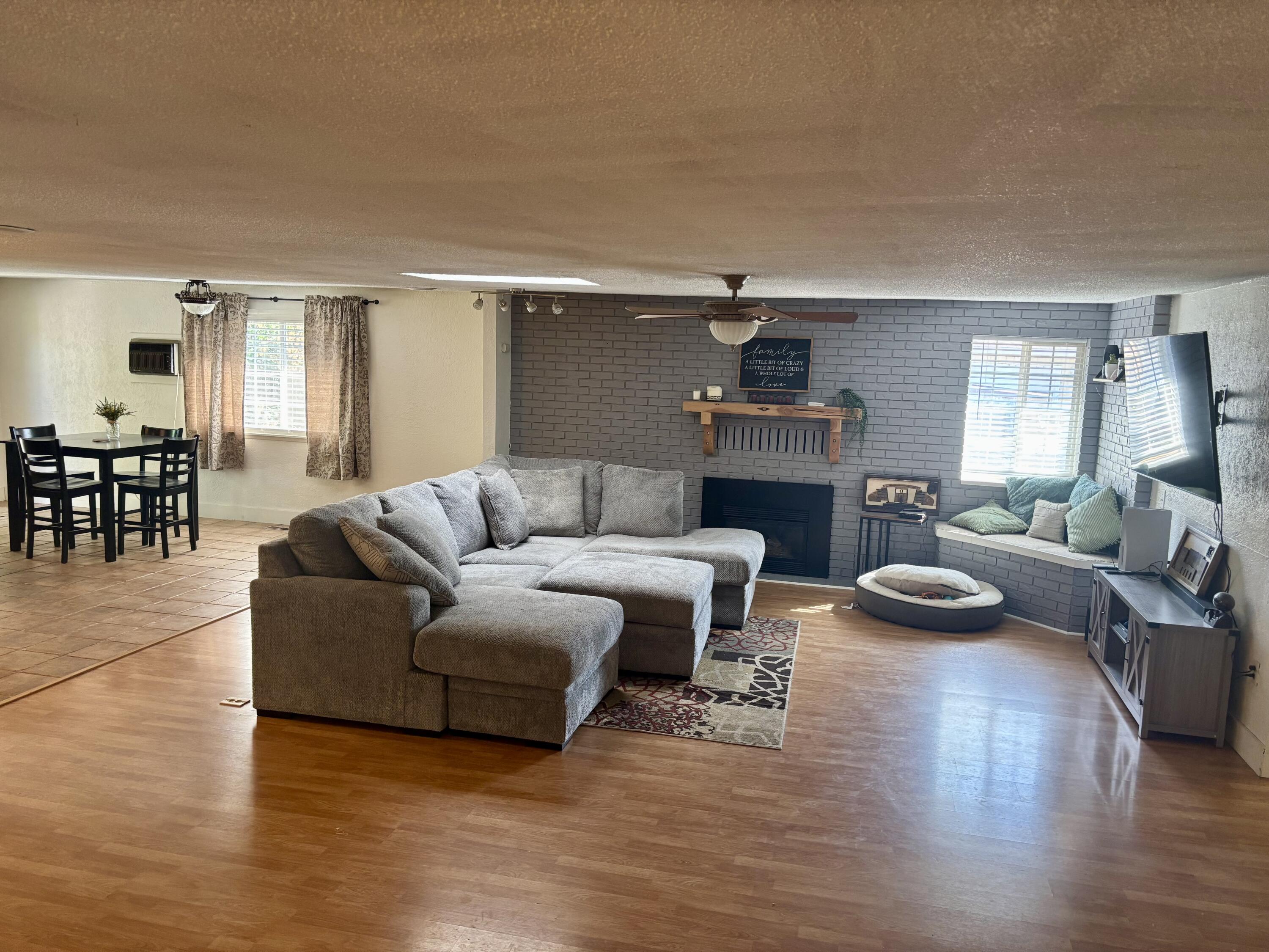 This home is over 1900 sq. ft. located in Sunset Village, with three bedrooms 2 baths, split floorplan all on one level. Beautiful kitchen has stainless steel appliances and solid surface countertops. Large open floor plan with the living, dining and kitchen area is open so guest and family can all be within one big area. The primary bedroom is on one side of the home with an additional bedroom and the third bedroom is on the other side of the home. The backyard has a circular fire pit and on each side of the home there is a possibility for RV parking.