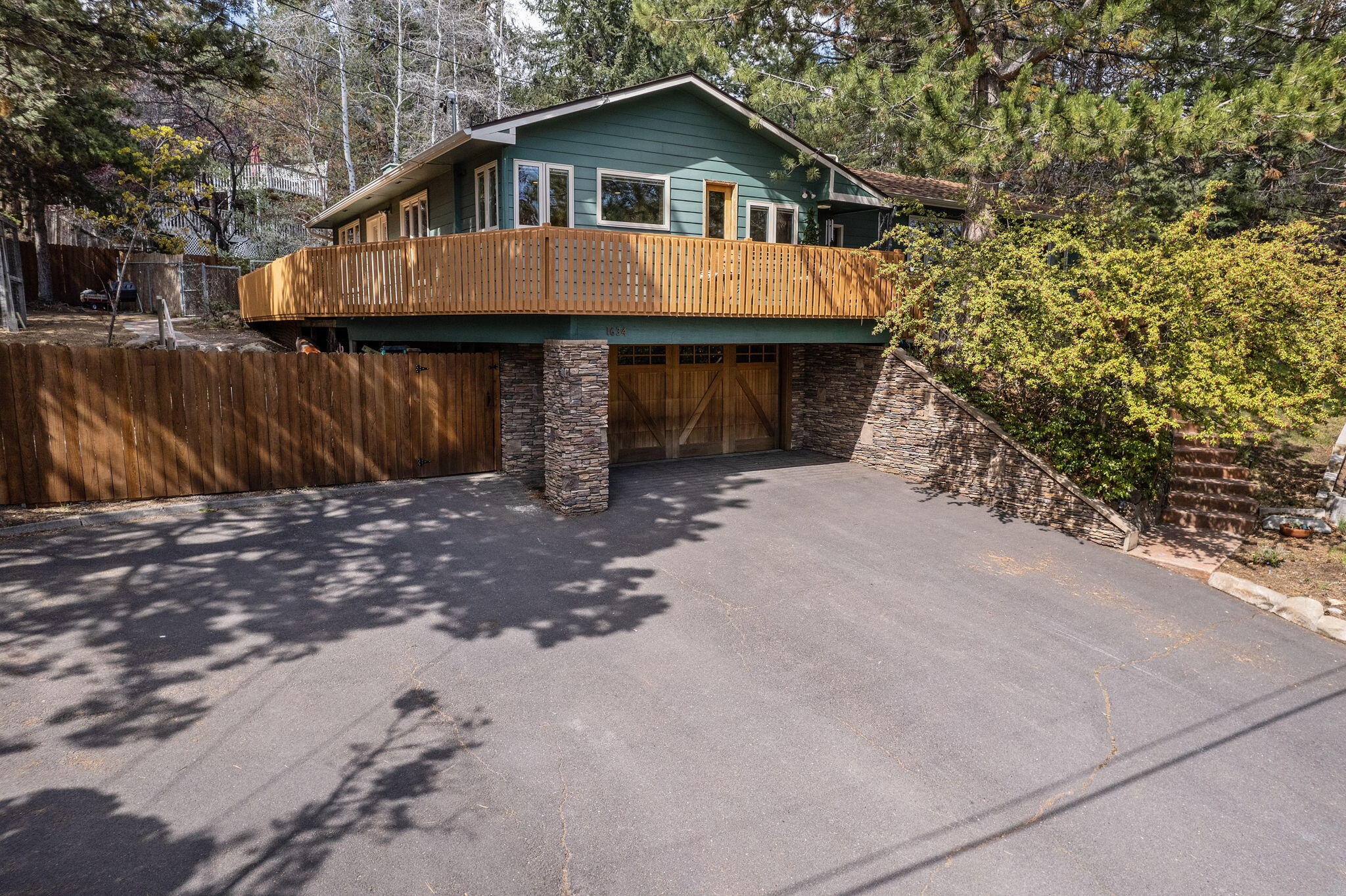Located in Bend's desirable West Hills neighborhood, this beautifully updated 4BR, 3 BA home is a true artisan's dream. With over 3.000 sqft of living space and sun filled south facing views, this home features a stunning kitchen w/ custom Maple cabinetry, double sinks, large butler pantry, breakfast nook and beautiful granite slab counters. Madrone hardwood floors throughout, built ins around every corner, a large mudroom with utility sink and gorgeous Pozzi wood wrapped windows/sliding doors. This home has main level living and a large bonus room, bedroom, full bath and laundry room downstairs. Fully fenced very private large backyard with mature trees, basketball/game court, chicken coop, raised garden beds and an interior and exterior patio for entertaining. There is an oversized two car garage with workshop and ample parking for recreational vehicles. Step out your front door and enjoy immediate access to parks, restaurants, breweries and shopping. This home is extraordinary!