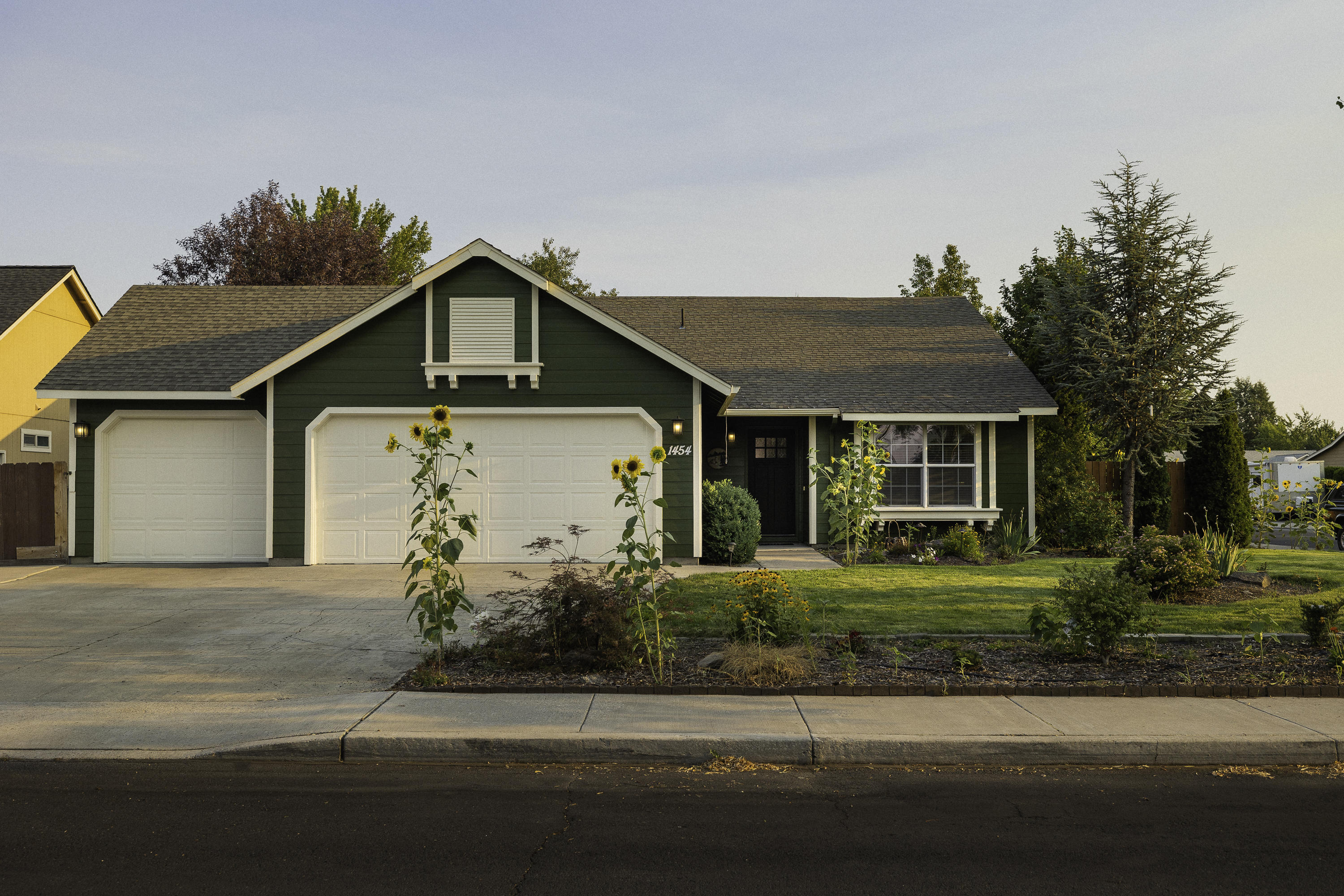 Pride of ownership throughout this beautiful single level home on a large corner lot in Canyon Point Estates! Mature landscaping, fully fenced, oversized patio, concrete gated RV/boat parking, a 3 car garage, & a large shed that could easily work as a shop. The kitchen features a slab granite counter island, lg pantry SS appliances & is open to a dining nook w/sliding door access to the backyard patio & garden. Grow your own vegetables in the green house while your pet enjoys the mini ''dog park'' in the backyard. New flooring, new exterior paint, & a hot tub perfectly placed for privacy. Vaulted ceilings in the family room w/a gas fireplace & ceiling fan. Primary bedroom features a walk-in closet & a dual sink bathroom. Very nice touch of upgrades in the guest bathroom. Enjoy the neighborhood, in close proximity to Dry River Canyon, shopping & the hospital. Easy access to HWY 97 w/numerous parks just blocks away! Open House Saturday 8/21 from 11-2pm. Stop by for a tour!