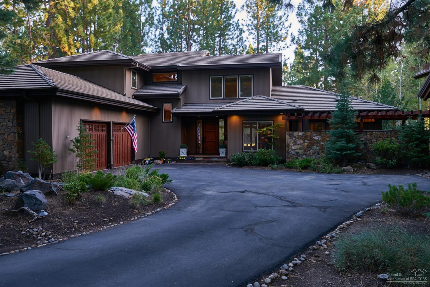 Spectacular Broken Top home situated along the 12th fairway, offering single level living; master-sutie with private deck and hot tub and separate office on main level. Custom Sun Forest home extensively remodeled in 2007-08 features a great room floor plan with soaring Montana moss rock wood-burning fireplace, hardwood flooring, warm paint colors and built-in cabinetry throughout. Entertainer's kitchen with a breakfast nook, island, slab granite counter tops, extensive cabinetry, stainless steel appliances and professional gas cooktop. Two ensuite bedrooms, one with roomy cabinetry for the hobbyist. Expansive deck with views of the golf course, super-sized two car garage with room for golf cart plus toys.