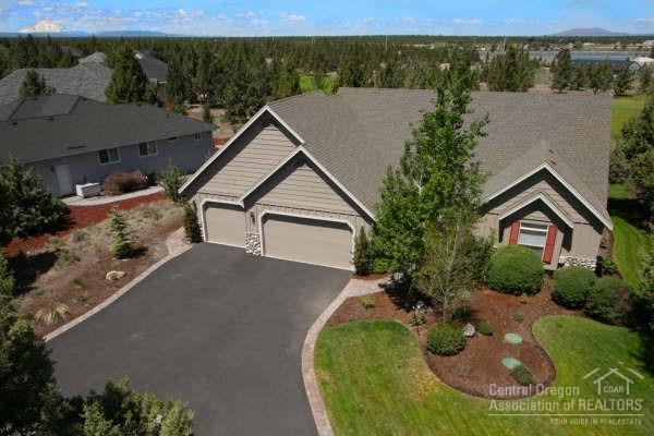 Enjoy Resort living in this one-of-a-kind custom built home. Beautifully appointed kitchen with radiant floor heat, tile countertops and cabinets galore. Privately situated on a large 1/2 acre lot, on the 6th fairway of the Challenge Course at Eagle Crest. Enjoy beautiful sunsets & Smith Rock views. This home includes all the amenities of Resort living, miles of walking/bike paths, 3 sport centers, 3 golf courses, indoor & outdoor pools, tennis & much more! All amenities are included with ownership.