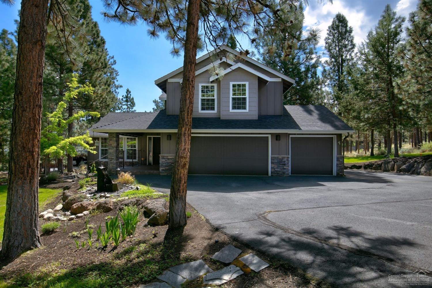 Located on a spacious lot in a quiet, park-like setting with it's own pond and additional water feature, this home has been lovingly maintained & updated. New owners will love the functional floor plan with main level master suite, bonus room & spacious great room. Great for entertaining, the home comes with a hot tub & sauna & a recently installed custom gas fire pit that sits on a large paver patio that is also plumbed for a gas grill. The large 3 car garage was finished with an epoxy coating.