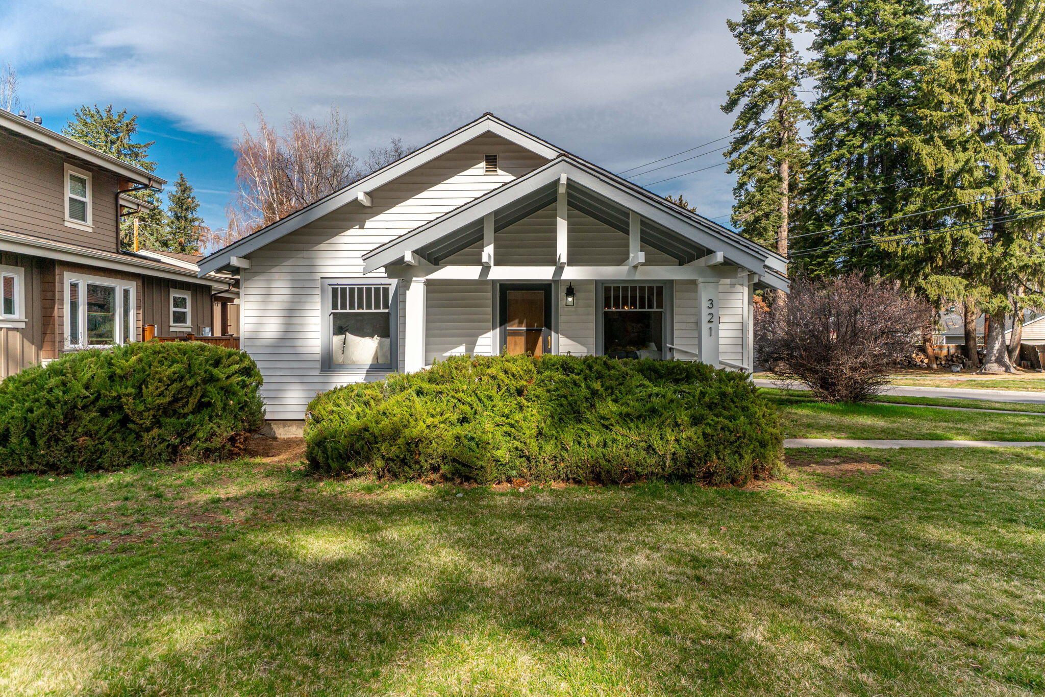 Discover an exceptional opportunity in Downtown Bend, just steps from Drake Park, the Deschutes River, & the vibrant culinary scene. This property offers a charming 2 BD, 1 BA home on a spacious corner lot. Featuring 1054 SF of updated single-level living space & a full-height basement, this home offers versatility & untapped potential. With a detached garage, it provides the perfect canvas for your vision. Originally built in 1925 and lightly updated, the home is ready for immediate occupancy. However, the true value lies in the land. Situated on the corner of Tumalo & Congress amidst multi-million dollar residences, this property offers a rare opportunity for customization. Across from the Historic District, the new owner has the freedom to implement desired changes, whether through an addition, remodel, or the creation of a brand-new dream home. Don't miss out on this remarkable location & its endless possibilities. Seize the opportunity to craft your ideal Downtown Bend lifestyle!