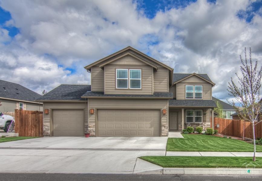 Come see this beautiful, nearly new construction home, with peekaboo mountain views. Plenty of room for toys with 3 car garage, and a shed. Enjoy the open floor plan with inviting kitchen and island that is great for entertaining. Cozy up to the warm gas fireplace in the winter or keep cool with the AC in the summer. Lots of space with big bonus room and 4 bedrooms. Call today for a showing!