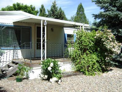 Live in Beautiful Wingspread Park. Clean and ready to move in. Home has built-in book shelves and storage. Living room had pop-out added that overlooks the duck pond. Enjoy those warm summer evenings from the deck or picnic area. Home features privacy on this prime location. Close to shopping, YMCA and easy access to freeway.