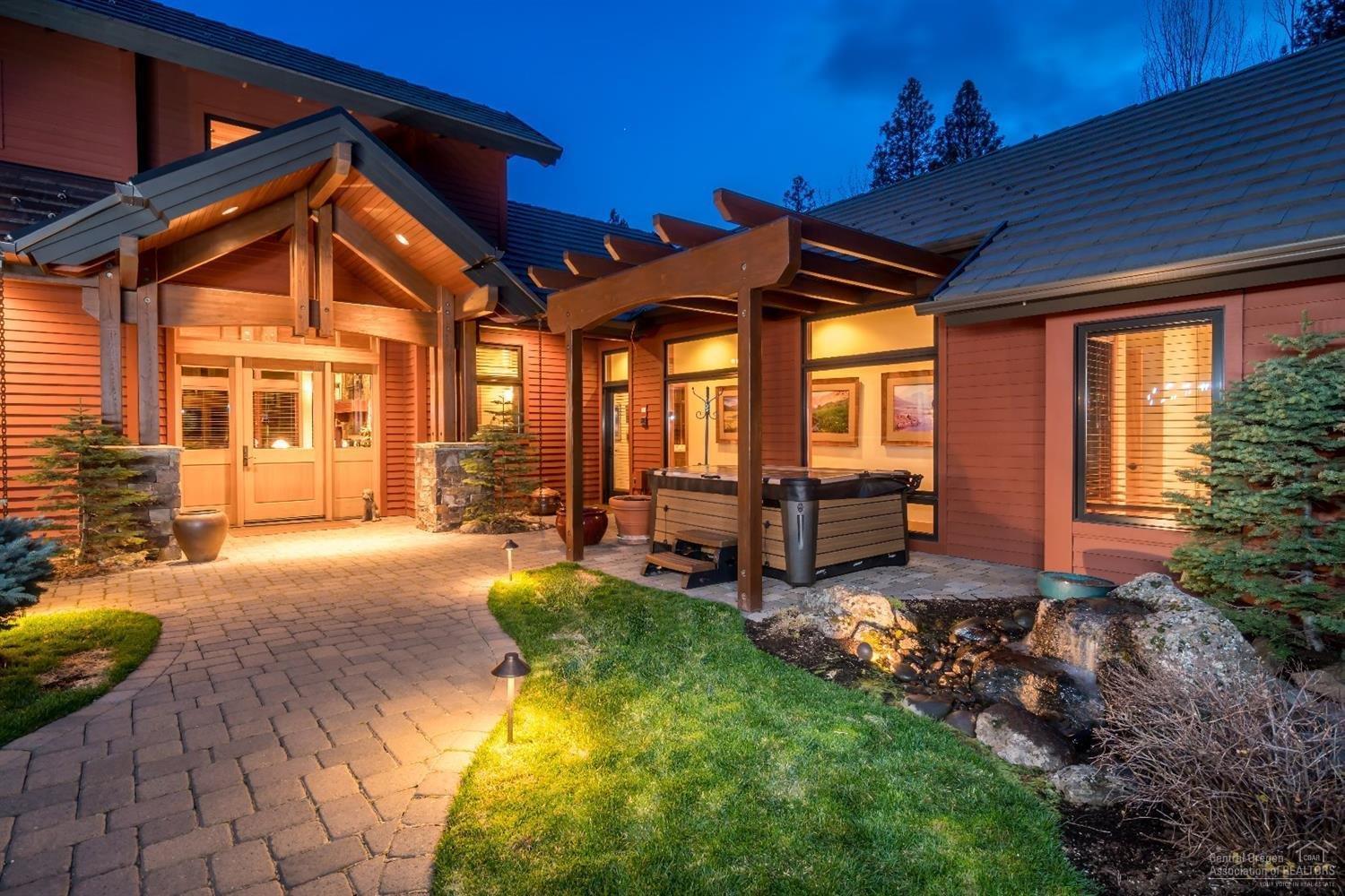 Highly sought after Norman Building & Design custom home. Elegant master suite, gourmet kitchen, full en' suite guest room, den/library and office all on the main level, as well as two additional guest rooms and loft upstairs. Amazing outdoor living spaces are perfect for entertaining and enjoying the great Central Oregon outdoors. Relax in the sanctuary of the private enclosed courtyard with tranquil water feature and hot-tub and enjoy backyard barbecues with stunning views down Broken Top's 15th fairway