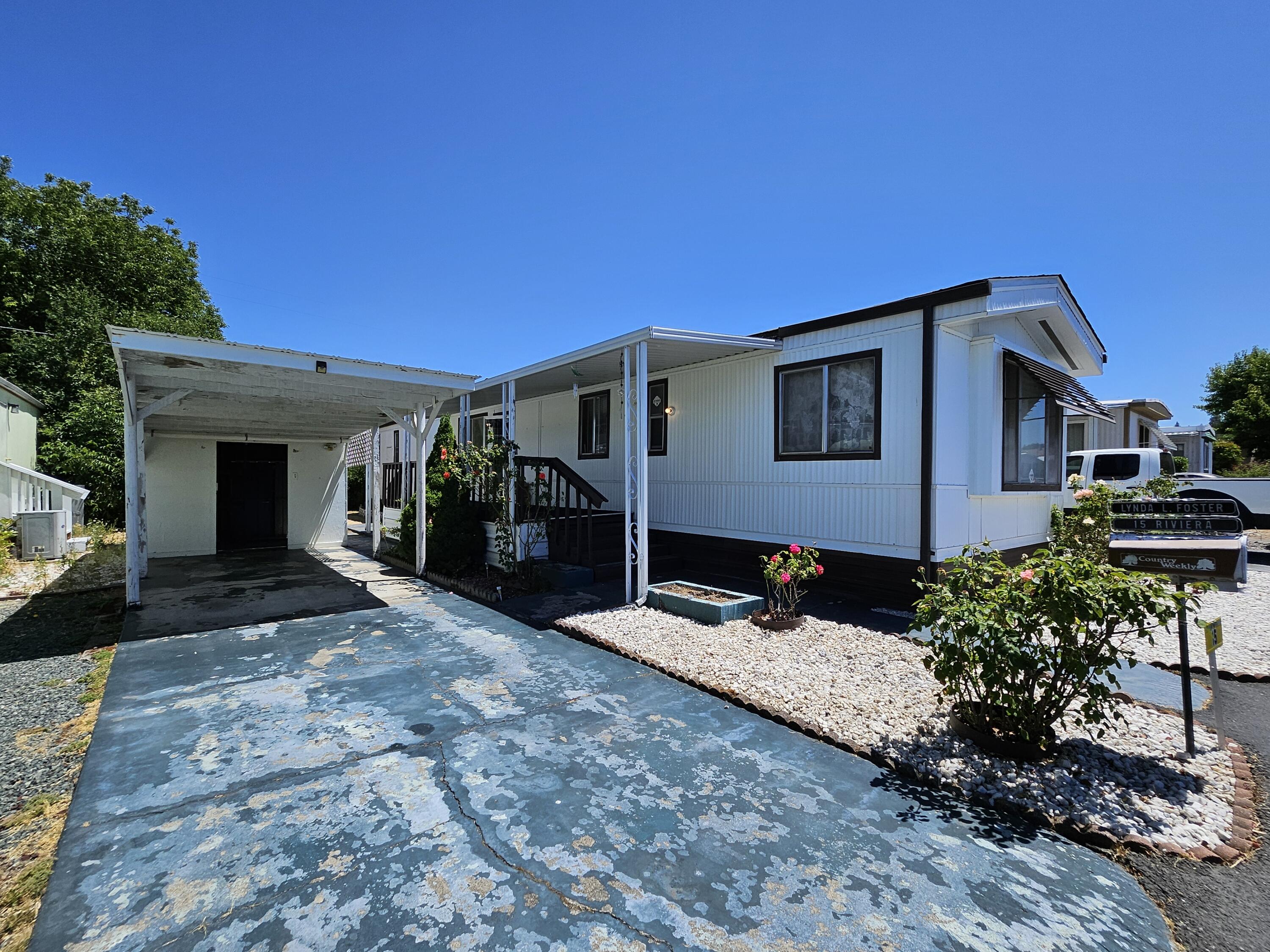 Welcome to Riviera mobile Park!   This affordable clean 2 bed 2 full bath home is ready for move in. Shed, yard and enjoy this on the Rogue River your place to enjoy. 55 plus community with space rent of $650 @ month and includes water, sewer and trash.  Quiet, nice and rural but close to all Grants Pass.  Price is for home only, no land included and must make space application at office.  Everything you see stays with home.  Make this perfect spot your next place to call home!
