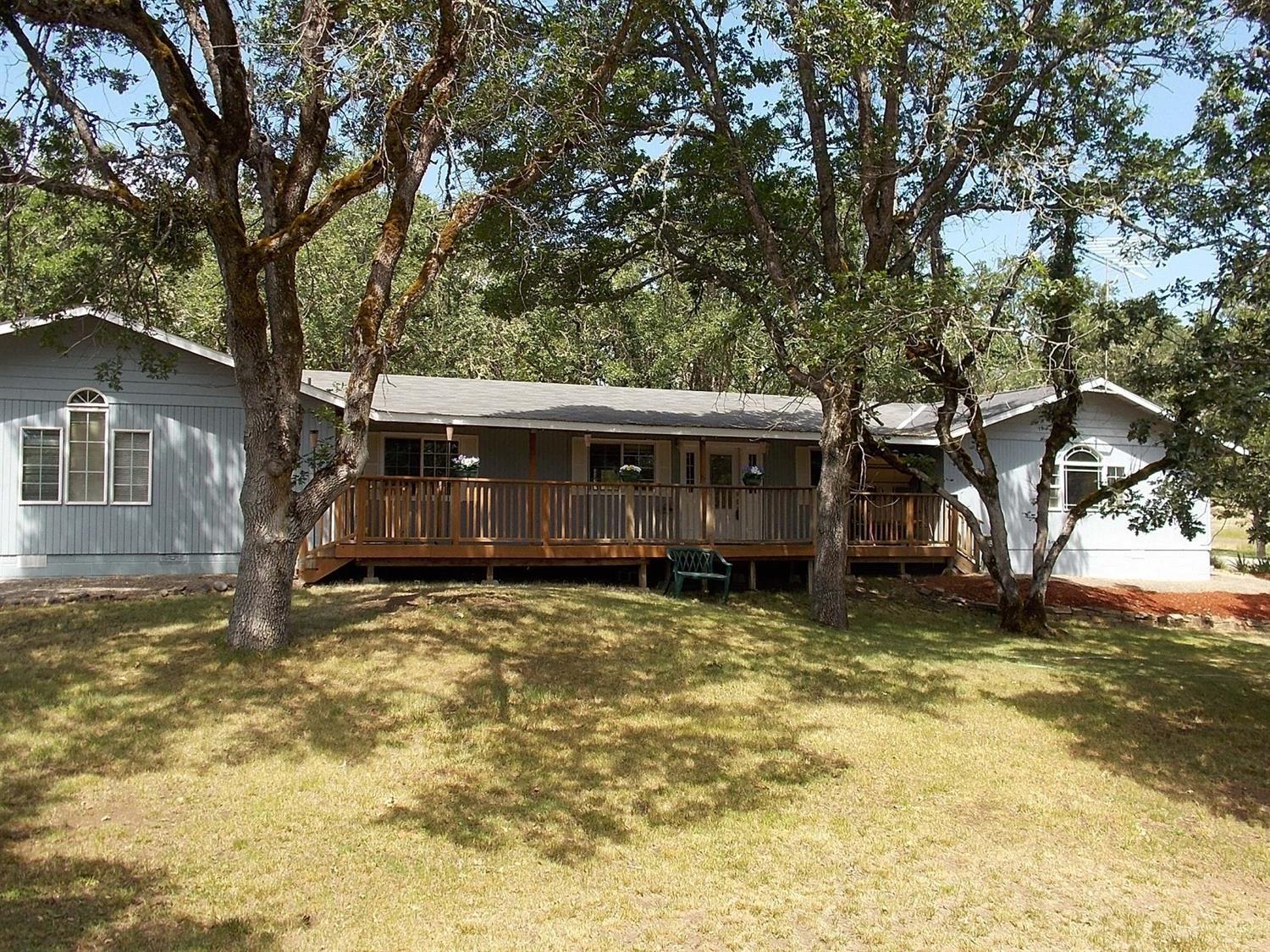 Gorgeous property with lovely views, off the deck of this 2600 sq. ft. home. There are 4 bedrooms an office and 2 1/2 bathrooms in this frame built home. Recently updated with granite counter tops, new cabinets, vanities and tile in the baths, making it the perfect country home If you enjoy wildlife and a peaceful setting you'll appreciate this mostly level 5 acre parcel. Property also includes a 900 sq. ft. insulated detached garage/shop with 220 volt power, good well, small shed, pole barn, 2 seasonal creeks. Perfect set up for 4H projects, horses or your favorite animals. Plenty of room for all your toys. Property line starts about 330 feet from Jones Road. Some virtual staging photos are shown, so you may envision all the possibilities.