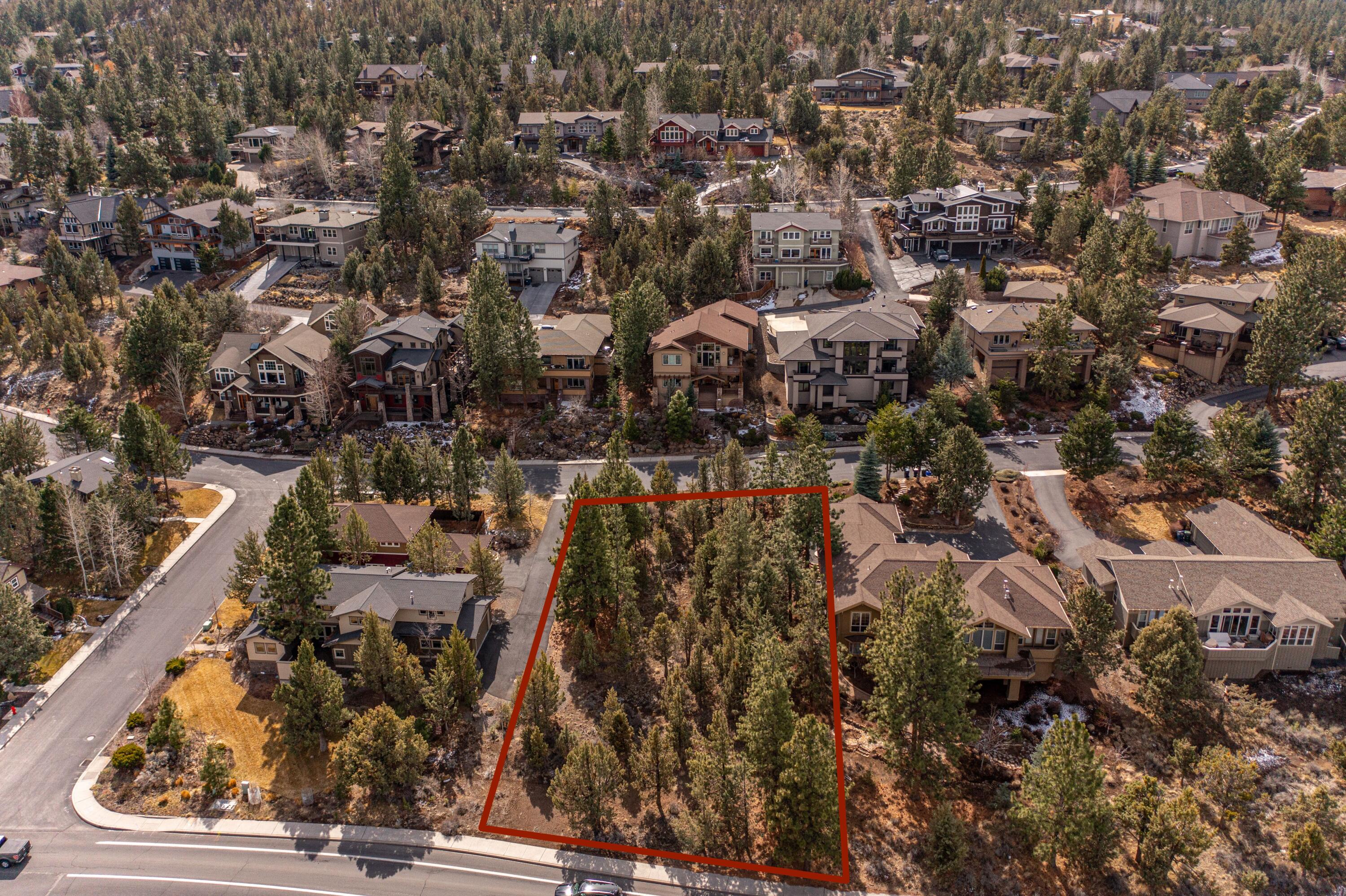 Tired of waiting for the perfect home? Build it! Located in desirable Northwest Bend, Awbrey Village, this spacious 0.35 acre lot features pine trees, public utilities, alley access, low monthly HOA dues, plus stunning custom homes all around. Plenty of room to construct your dream home and space for a front and back yard to relax or entertain your guests. Restaurants, the Deschutes River, dog parks, schools, and trails are just minutes from where your front door could be. Bring your favorite builder to this lot and build the home you have always wanted.
