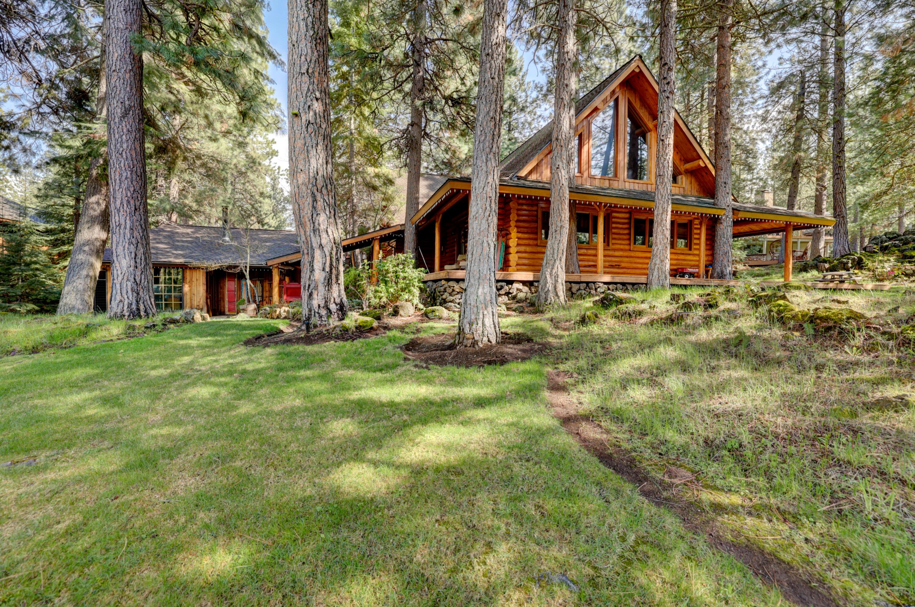 This is a must-see property. Nestled amongst the pines off of the 13th fairway, this home offers the perfect location for a variety of activities. Whether you choose to swim at nearby Paulina Pool, take a leisurely bike ride through the meadow, or a walk along the wooden bridge, there's never a shortage of activities to enjoy right from your front doorstep. It is a beautiful gathering space for family and friends, by the fireplace in winter months and on the wrap around deck in the warmer months. One step inside this beautiful cabin is all it will take for you to feel like you're home.