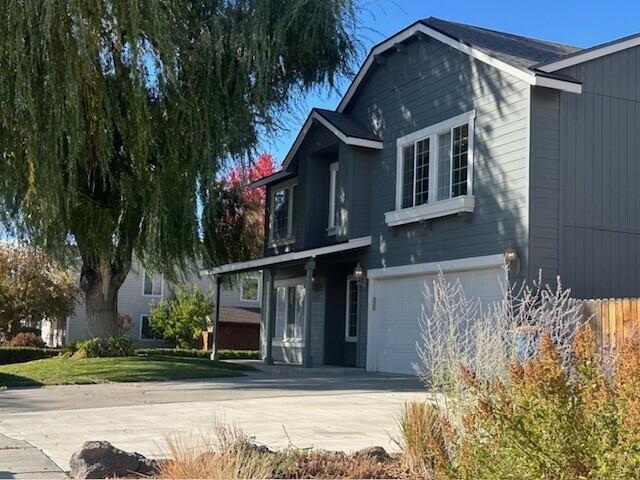 Lovely home located in a desirable neighborhood, on the NW corner of a cul-de-sac. It features newer ext. paint & fresh int. paint, & a new roof with a transferable warranty. It has 3 bedrooms, each with its own walk-in closet, 2.5 baths & 3 living spaces. You'll find H/W floors in the entry, as well as in the eating area & kitchen. The kitchen boasts SS appliances, a pantry, an island, & flows seamlessly into the family room where you'll find an attractive tiled gas fireplace. In addition, it has A/C, Crown Moulding throughout, a newer H2O Heater (2018), plus 4 ceiling fans. Relax & enjoy your favorite drink while soaking in your Hot Tub & listening to the beautiful water features in your landscaped, private backyard. There you'll also find a large, covered paver patio with lighting, great for entertaining, a 12X16 storage shed for your ''extras'' & RV parking behind the fence. It's a great location, just minutes from Quince Park, Dry Creek Canyon & downtown Redmond!