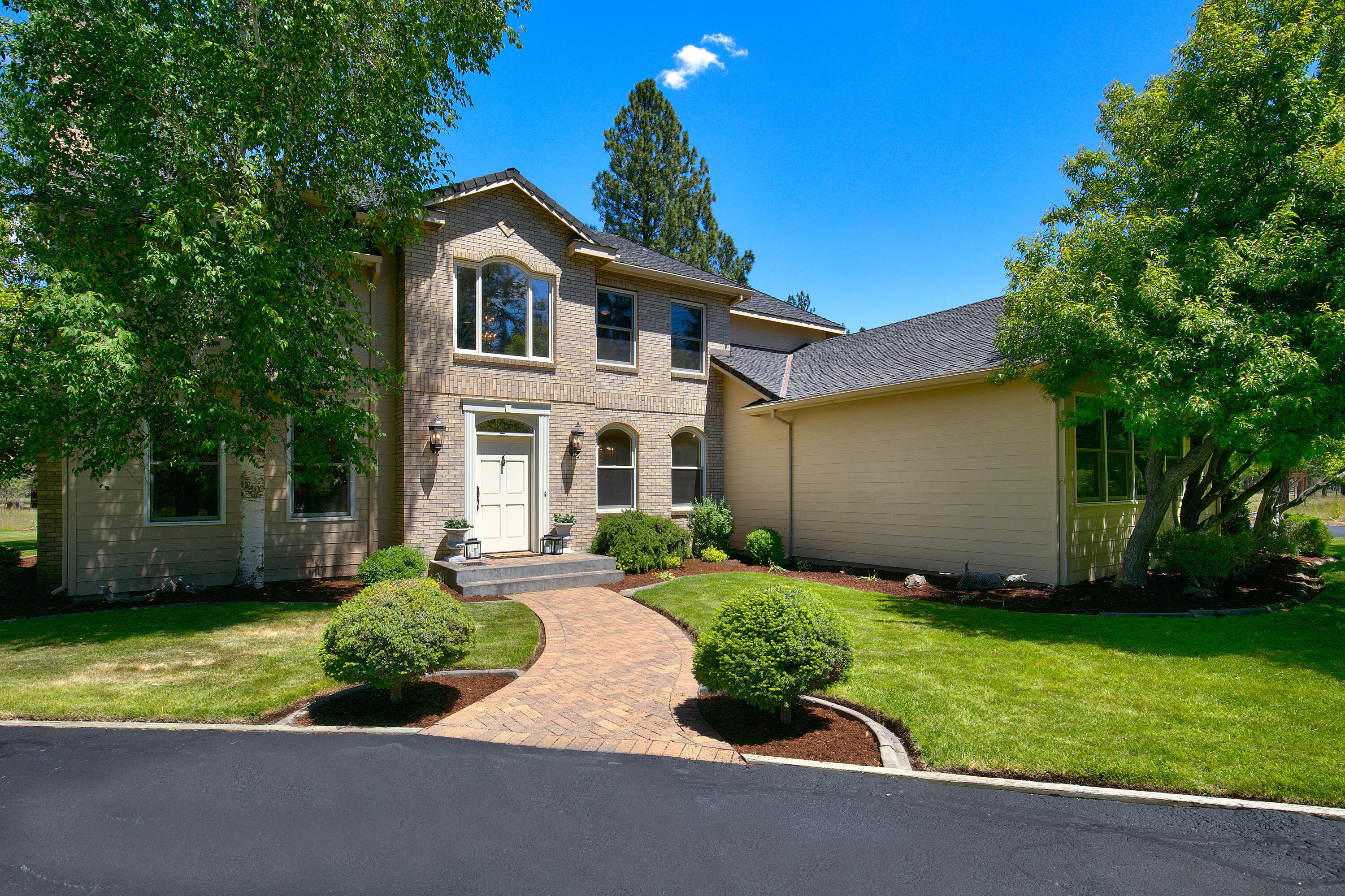 First time on the market! This classic custom home sits on over 10 level acres, just a 3 minute drive to downtown Sisters! This 3,839 sq. ft home features 5 bedrooms (3 bedrooms with ensuite baths), 4 full bathrooms, sitting room with wood burning fireplace, living room with propane stove, formal dining room, large/updated chef's kitchen with granite counters, stainless appliances and breakfast nook. Office, solarium, laundry/mudroom, huge attached 3 car garage. This huge lot allows for horse lovers to build the barn/facilities they've always dreamed of! The craftsmanship and timeless style of this home is truly unique and must be seen to appreciate.