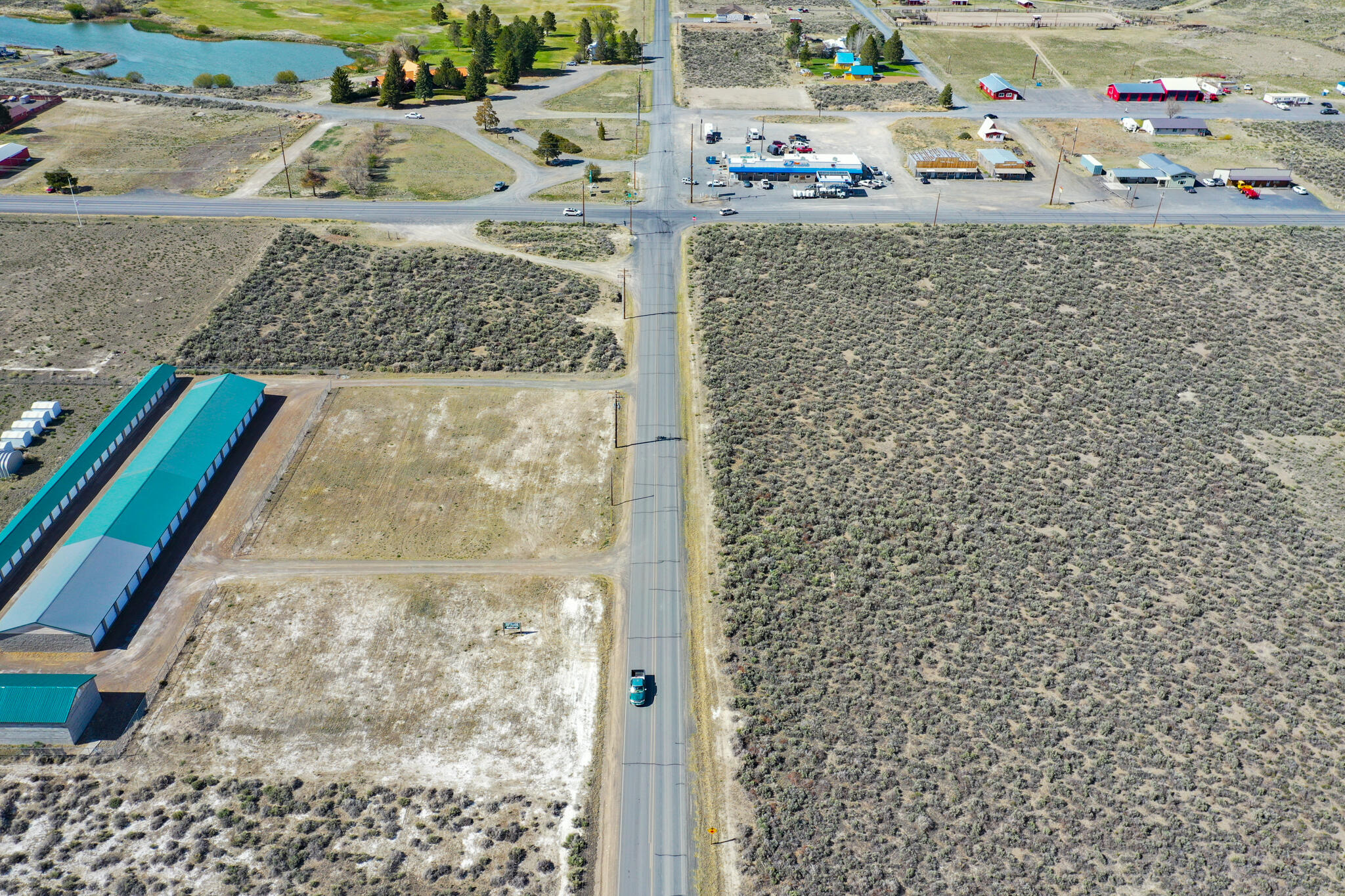 Excellent high profile, high visibility commercial development opportunity with a secondary parcel in the heart of the expanding Christmas Valley! These two parcels are 1.6 acres, a flat corner lot is set on prime Christmas Valley Highway frontage directly across from a busy intersection with a gas station and market. Bring your creative business ideas and thrive for years to come! Domestic water and power available at the street. There are many businesses in town along with a 9 hole golf course. Very popular nearby attractions that brings adventure seekers, off-road riders and tourists to the area; Fort Rock, Christmas Valley sand dunes for excellent riding, hot springs, Crack-in-the-Ground, numerous lakes to fish and more. Invest now in this growing community and your future! Buyer to perform their own due diligence on commercial, land use and conditional use permits.