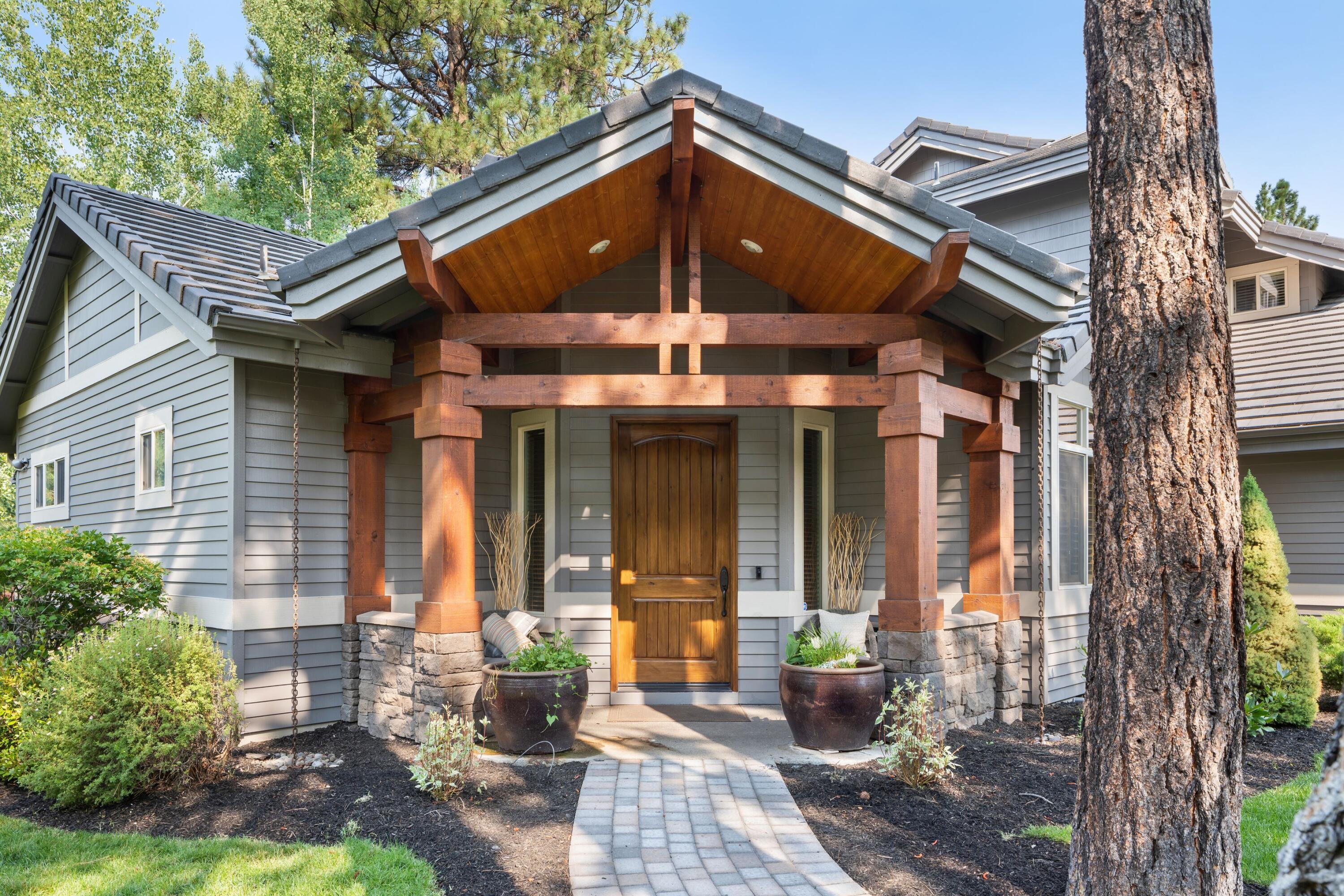 Nestled within the picturesque landscape of Bend, Oregon, this beautiful townhouse offers a blend of modern design and natural beauty. Positioned in a peaceful and coveted neighborhood within the gated community of Broken Top, this home presents a unique opportunity for discerning buyers seeking sophistication, ease, and tranquility. Upon entering the foyer with updated tile work, you will see the office space and the main living room with its grand shiplap wall and tiled gas fireplace. There are two generous primary suites on either side of the main level. Each bedroom offers full tile showers, walk in closets, and ample storage space. 
The main hub of the home is the kitchen area which has updated appliances, cabinetry, backsplash, and counter tops. The corner pantry is convenient and enhances the functionality of the kitchen. Upstairs you will find a bedroom, loft and bonus space, with a jack and jill bathroom. Out back you will love the full paver patio and fully fenced in space.