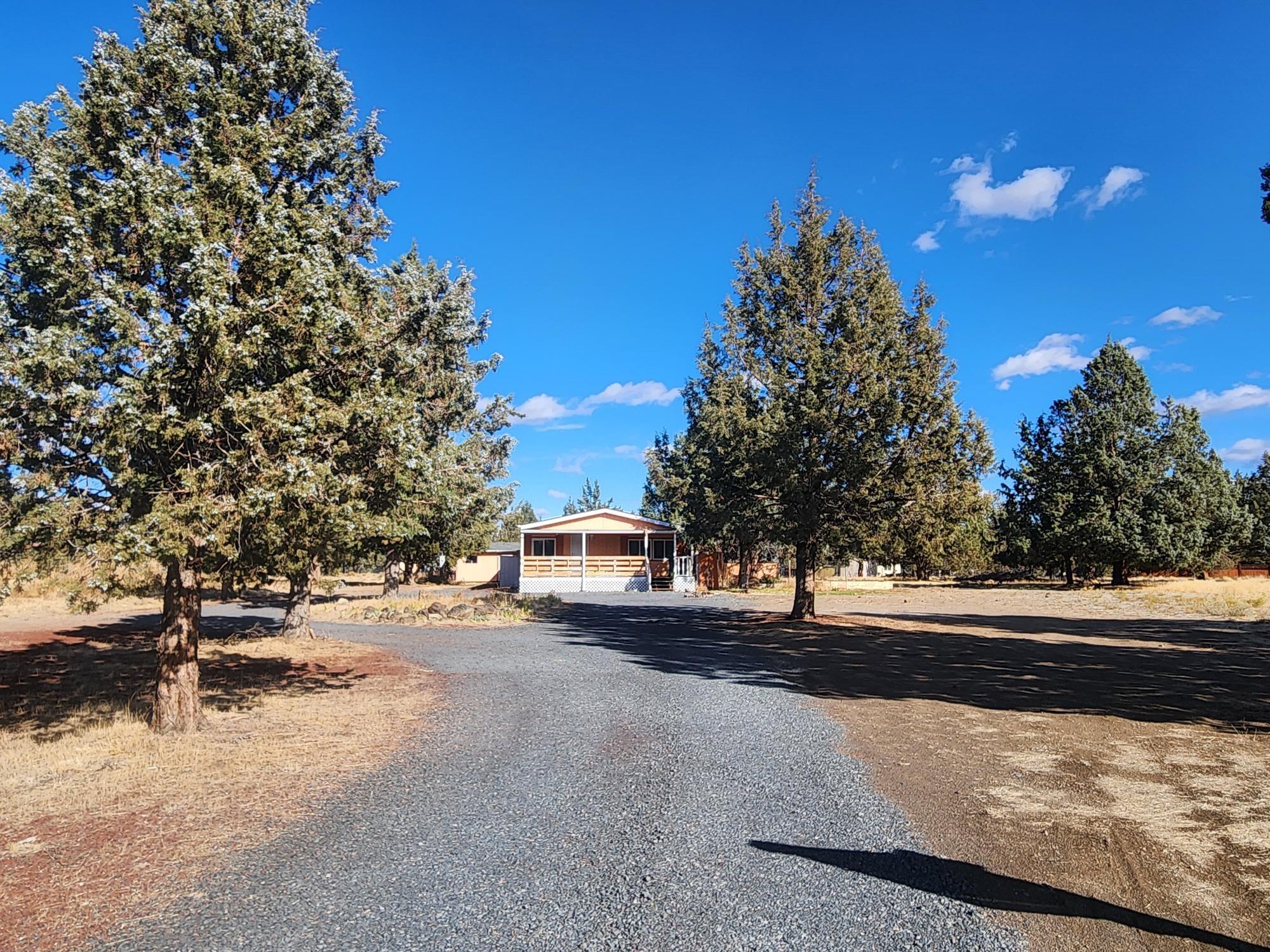 Priced to Sell, this single level home is 1620 sq ft, has 3 bedrooms and 2 bathrooms and sits on 1.03 acre, home has a great lay out, kitchen is large has an island, skylight, laminate floors and eating nook, also, a dining room, huge living room and large family w/lots of windows, primary suite is large and has 2 closets, large vanity, soaking tub, stall shower, lots of storage and good separation from the other rooms. Other features are Heat pump, 2 storage units, circular gravel driveway and lots of room for all your toys and animals. With a little paint and some love, you can make this home your own. Crooked River Ranch offers: golf, tennis, swimming, fishing, hiking, abundant wildlife and a rich community life. Just minutes to recreation, shopping and entertainment, and only 3 blocks to a great park & walking trail. Make an appointment to view today!