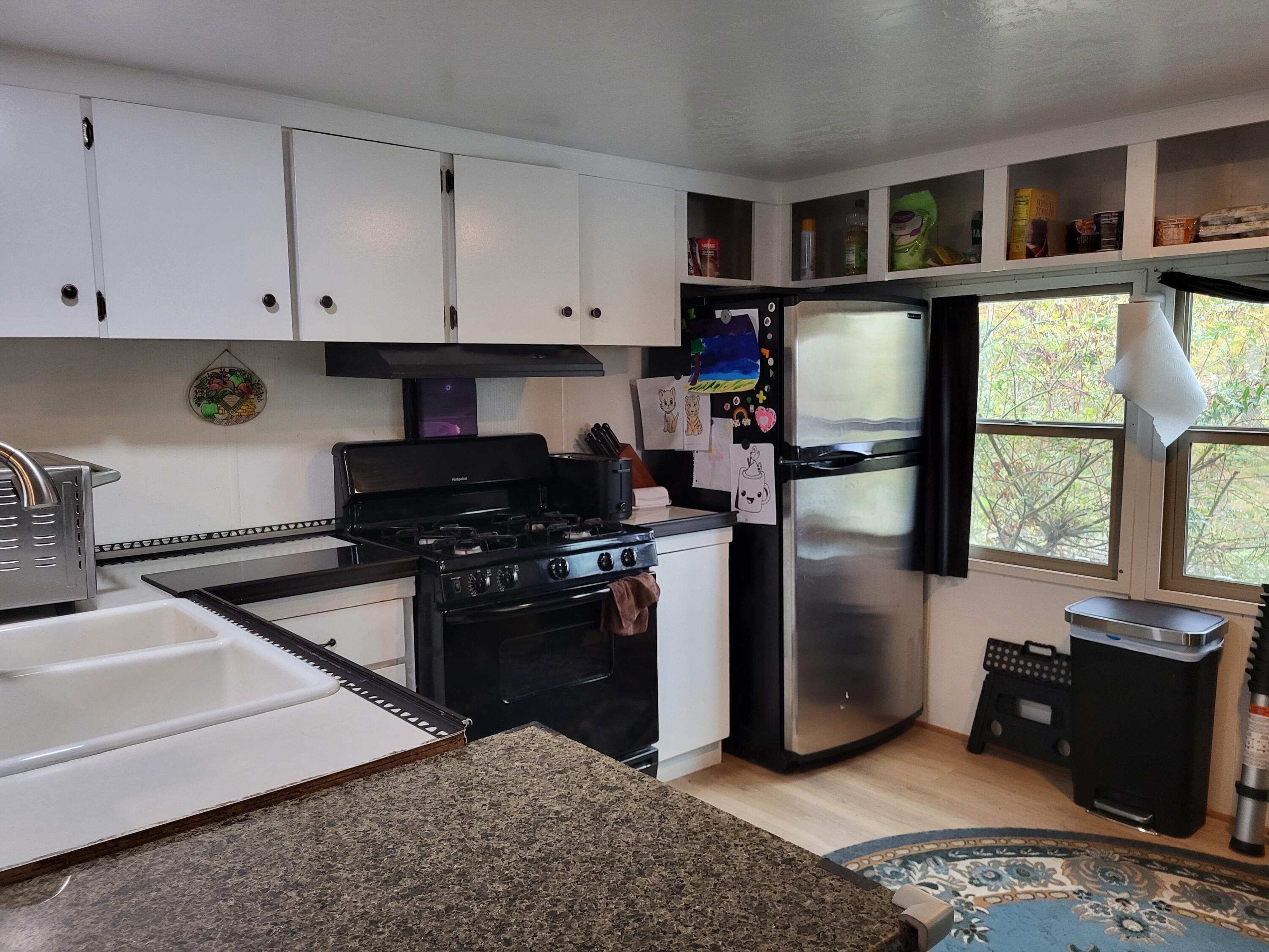 MUST BE MOVED!!!!
Rehabbed 2/2 with newly redone bathrooms, kitchen, ceilings, lighting and recent water heater new parts installation.  Washer, dryer, gas range, refrigerator and microwave included.
Tongue on.  Needs axels.  MUST BE MOVED