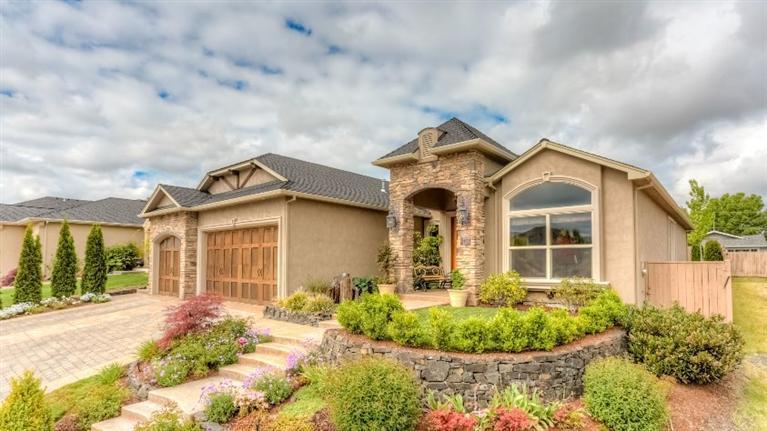 This spectacular Pagnini built home is a work of art. The 2518 sq/ft single level home has an open floor plan with 3 bdrms, 2 1/ 2 baths, fully paneled office w/ pocket doors, dining area with wood and travertine flooring & coffered ceiling, arched hallways, and a great room with vaulted ceiling. Large eat-in kitchen with a 6 burner Pertazzoni cooktop, double wall ovens, built in microwave, skylight, oversized center island, granite counters, and floor to ceiling custom cabinetry. Master bedroom suite has it all. Separated from the other 2 bedrooms, it has coved ceilings with French doors, & a master bath with jetted tub, granite counters, travertine shower with glass tile and glass doors and walk-in closet with built storage. Living room with fireplace & glass tile surround, floor to ceiling custom built-ins, & windows that look out on the landscaped fenced back yard and covered patio with an out-door kitchen with Wolf barbeque, sink, refrigerator and abundant storage & counter space.