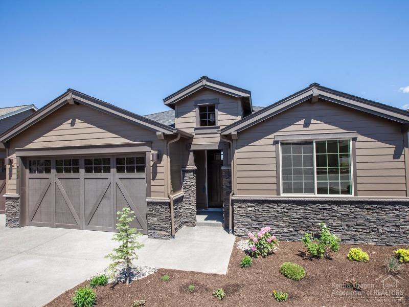 Pahlisch Homes new construction in River's Edge Ph 17, with stunning views & steps to the golf course. Great custom quality finishes include inviting entry into great rm, cofferred ceiling, lg windows providing lots of light, quartz countertops, SS appliances, engineered hardwoods, walk-in closet & more. Model home open Thur-Sun 11 to 3 at 2501 NW Pine Terrace.