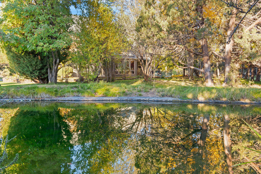 Priced for immediate sale... Privacy and serenity abound with this two-story charmer on 10 acres with irrigation rights. A sunroom brings the outdoors in on the main living area, and is a focal point on the main floor. A wood burning stove, skylights, and an open floor plan all combine to create an ambiance which is welcoming and peaceful. On the second floor, you will be greeted by a bonus room and two large BR's w/ a loft in each room. Water provided by Avion Water Company (no private well maintenance!). Large Hot tub and outdoor storage shed will be included with home at closing. The mature landscaping, neighboring large parcels, and fresh water pond on this property help achieve a Shangri-La type setting which cannot be found elsewhere in Central Oregon at this price point. Bring your horses, this property is horse friendly! Estate sale by executor of the estate. Home is being sold ''as-is''. Any repairs necessary in order for buyer's financing shall be done at buyer's expense.
