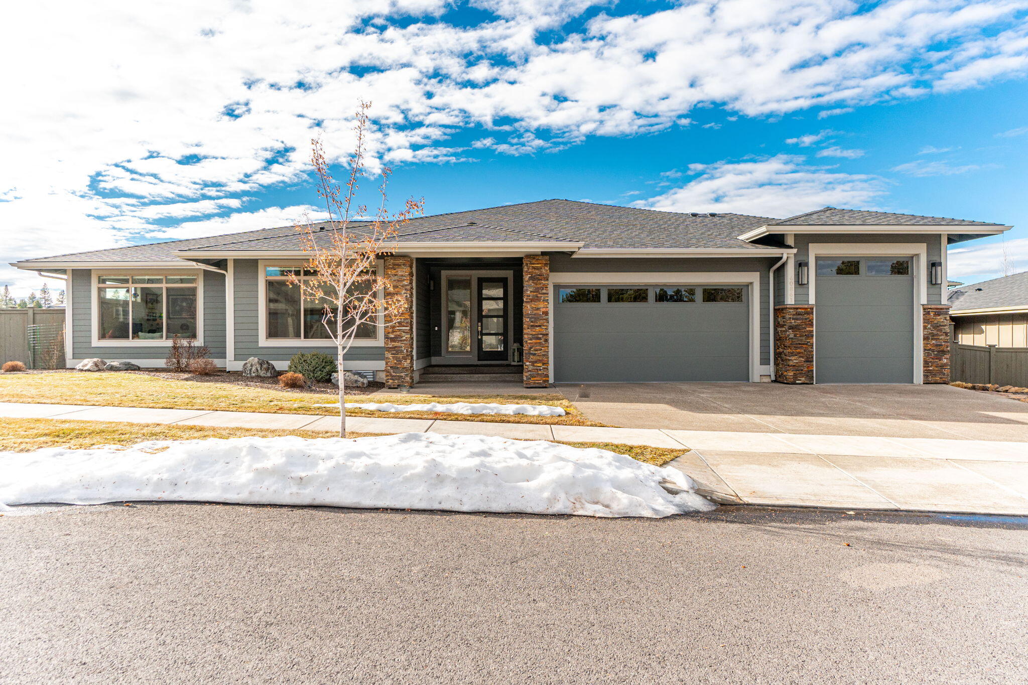Absolutely stunning true single-level home on a spacious .26-acre lot in the sought-after River Vale neighborhood with peek-a-boo Cascade Mountain views. Step into a world of sophistication with this better-than-new residence reflecting the epitome of luxury living. Revel in the meticulously crafted upgrades, including a cabinet-finished Sub-Zero refrigerator, exquisite light fixtures, Hunter Douglas blinds, solar panels and so much more! Thoughtfully designed floor plan separating the primary suite for privacy. The butler pantry, complete with a wine fridge, adds an extra touch of elegance, perfect for entertaining. Efficiency meets style with a tankless water heater ensuring comfort and convenience. 3-car garage with finished Polyurea floors, RV bay and intentional landscaping including raised garden beds. Welcome home to a life of unparalleled comfort and elegance just minutes from the Old Mill and downtown.