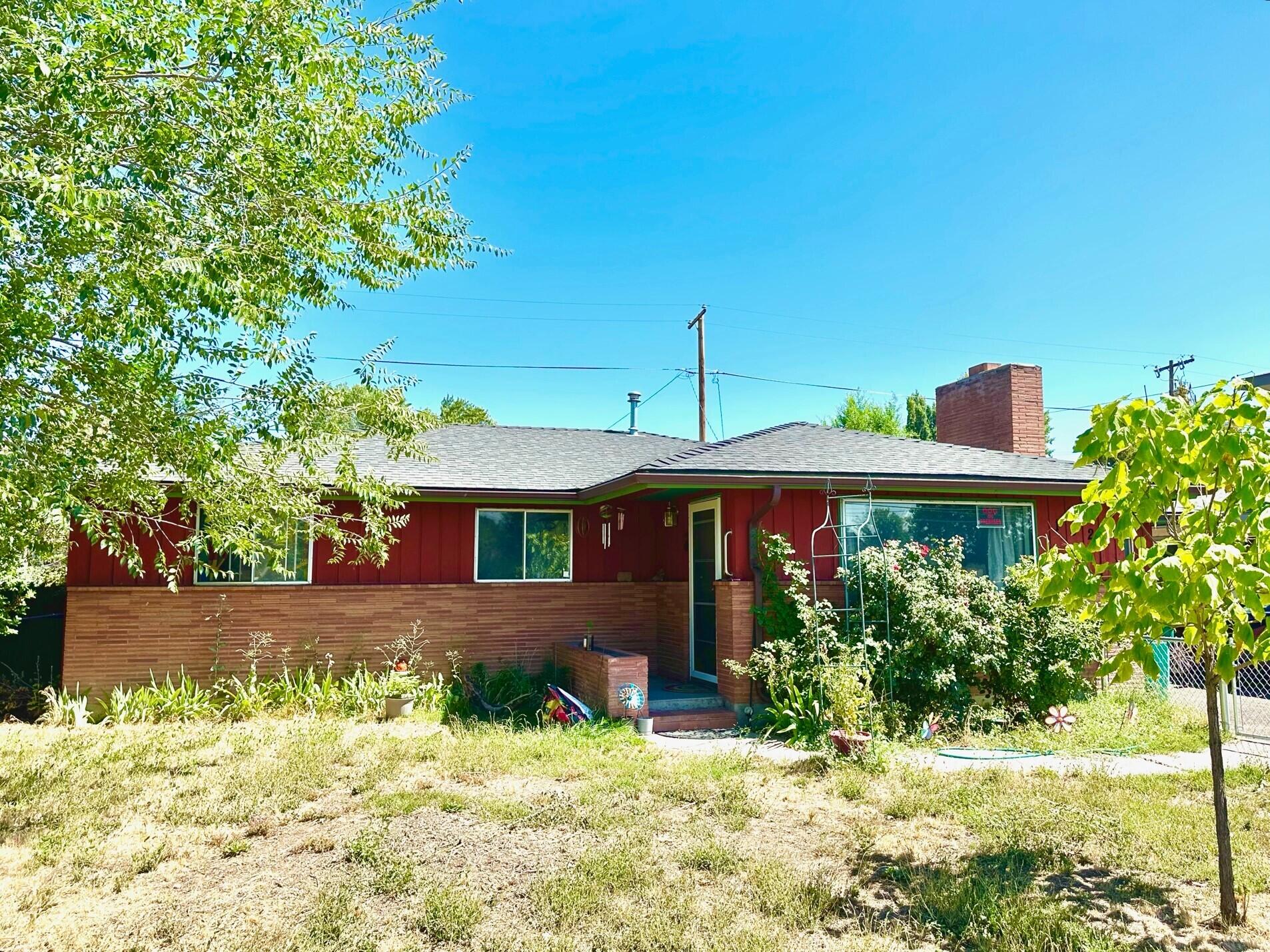 This house is centrally located in Klamath Falls and is close to shopping and public transportation. With two living spaces, there are so many ways to utilize the converted garage: workout room/home gym, Large office, giant playroom, home theater, sports den, game room ...or even turn it back into a garage. The main living room is just off the kitchen, and is large and comfortable with a fireplace and large inviting with a large picture window to let in natural light.  this three good sized bedrooms share the bathroom that has a shower tub combination and lots of counter space. Outside you'll find a fenced front yard, a fully enclosed backyard that has a very nice shed for additional storage. Please make your appointment today to see this well priced home