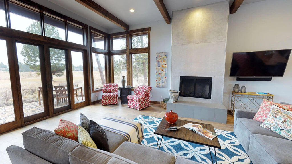 Located in the exclusive Caldera Springs community, 56976 Dancing Rock Loop is the perfect basecamp for exploring Sunriver and beyond. This 2,580 sq. ft. home has 3 bedrooms and 3.5 bathrooms, making it enjoyable for up to 8 guests. Inside this luxurious, contemporary home, you will find spacious kitchen, living, and dining areas with beautiful hardwood floors,  tall ceilings, wood accents, and large windows to take in the surrounding views of the Caldera Links Course and natural landscape.
