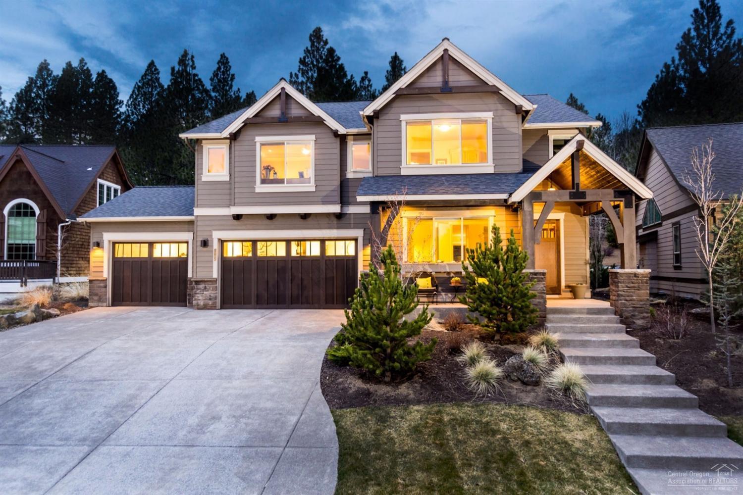 Prepare to be impressed with the thoughtful design of this former model home. The great room incorporates a tech bar for devices & work alike next to the fabulous kitchen with extra island & counter seating. Main floor office is separate from the hub of the home. Upstairs boasts a bonus room w/ wet bar, large master with fireplace, sitting area and gorgeous bath & 3 addl. bedrooms. The 4-car garage & ideal location near Shevlin Park, 3 schools, dog park, and Northwest Crossing amenities add great value!
