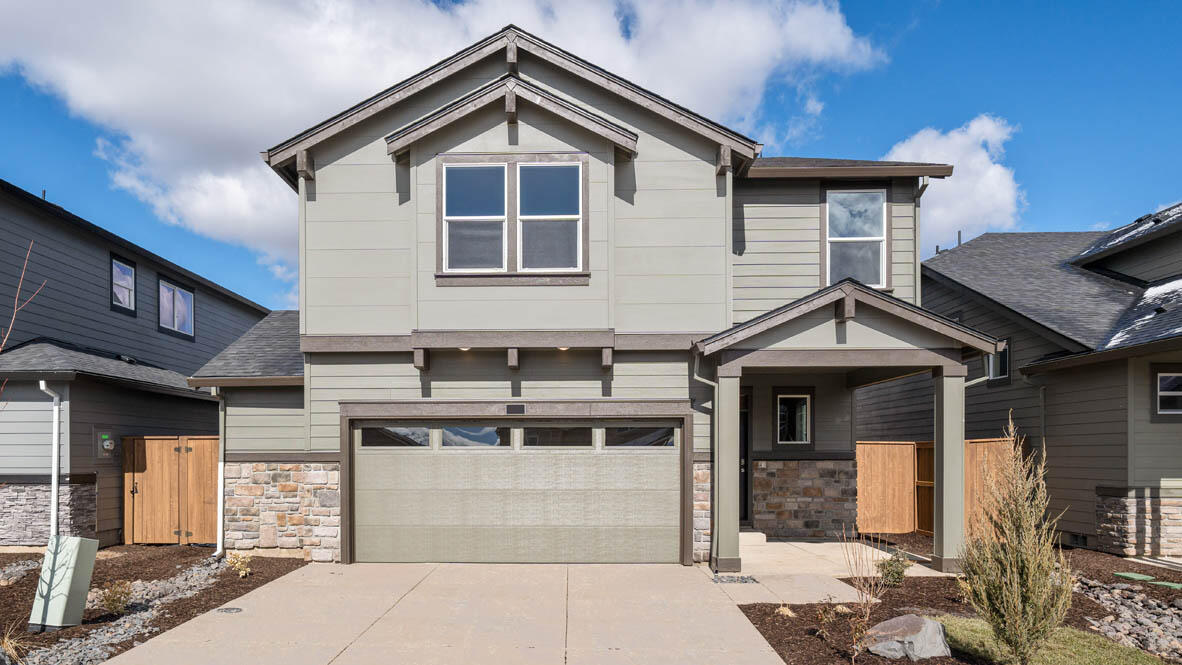 Special interest rate and closing cost credit!! Homesite with garage bump out for extra storage! Experience Stevens Ranch, the new master planned community in SE Bend near Reed Market Rd & 27th.   Convenient access to Bend Parkway, Old Mill, the new Bend Library and downtown Bend. Our popular Pacific two-story floor plan has 4 bedrooms, a huge bonus room, 2.5 bathrooms, and a large den on the main floor perfect for an at-home office. The open concept living space has stunning modern finishes throughout with hardwood laminate flooring and designer touches throughout.  The chef-inspired kitchen features stainless-steel gas appliances, quartz countertops with solid surface backsplash, and range/oven. The primary bedroom ensuite features a double vanity sink, walk-in shower, and a spacious walk-in closet. Receive a closing cost credit with builder's preferred lender. Call for details. Photos are representative of plan, features/specs may vary.