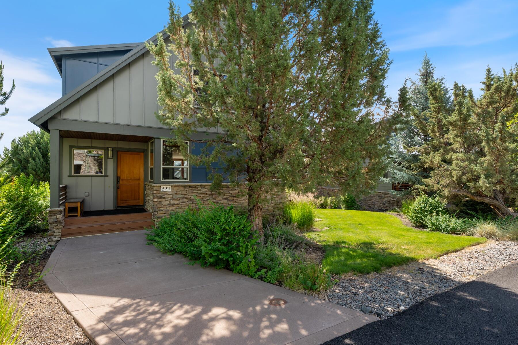 Spectacular treetop and eastern views of the Ochoco Mountain Range and situated within Highland Parks at Eagle Crest Resort. This contemporary loft home features large windows for an abundance of natural light, Cherry hardwood floors, solid core doors and custom cabinetry with freshly painted white walls! The Primary en-suite offers morning sunrises with a walk-in closet and storage closet, double vanity soaking tub & tiled shower. Two additional bedrooms with a shared bath are perfect for guests. The open kitchen offers ample storage and direct access to the south facing patio for coffee on the patio or dining outside during the spectacular Central Oregon evenings. The two car extended garage is perfect for extra storage or all your recreational toys. Enjoy all the amenities that Eagle Crest offers, including 3 18 hole golf courses, sport courts and miles of trails.